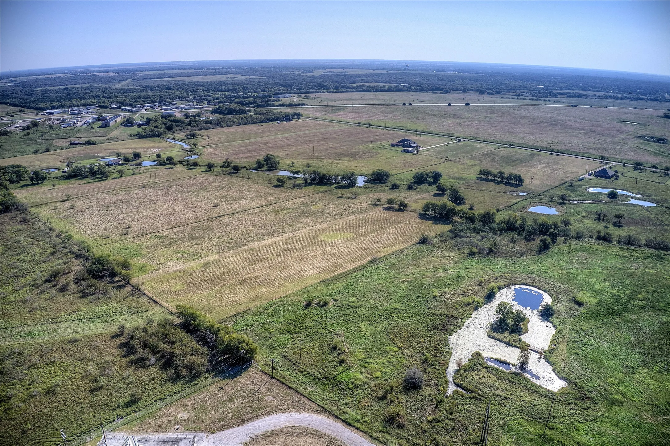 Aerial view of property's location featuring rural landscape