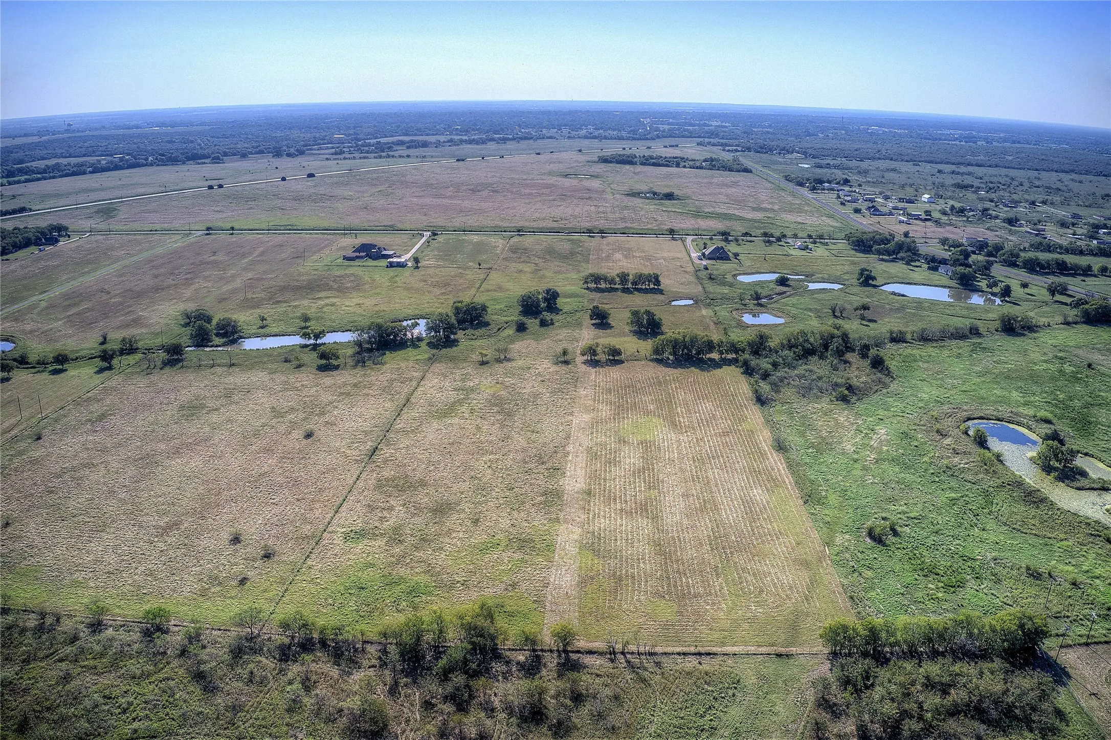 Overview of rural landscape featuring farmland