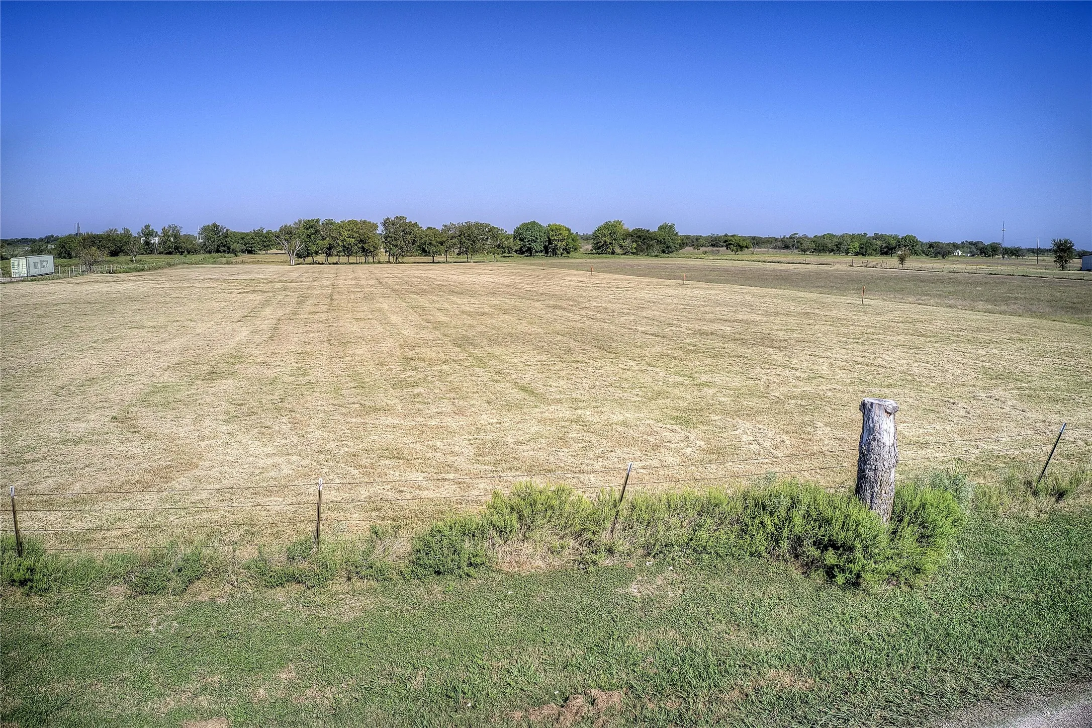 View of yard with a rural view