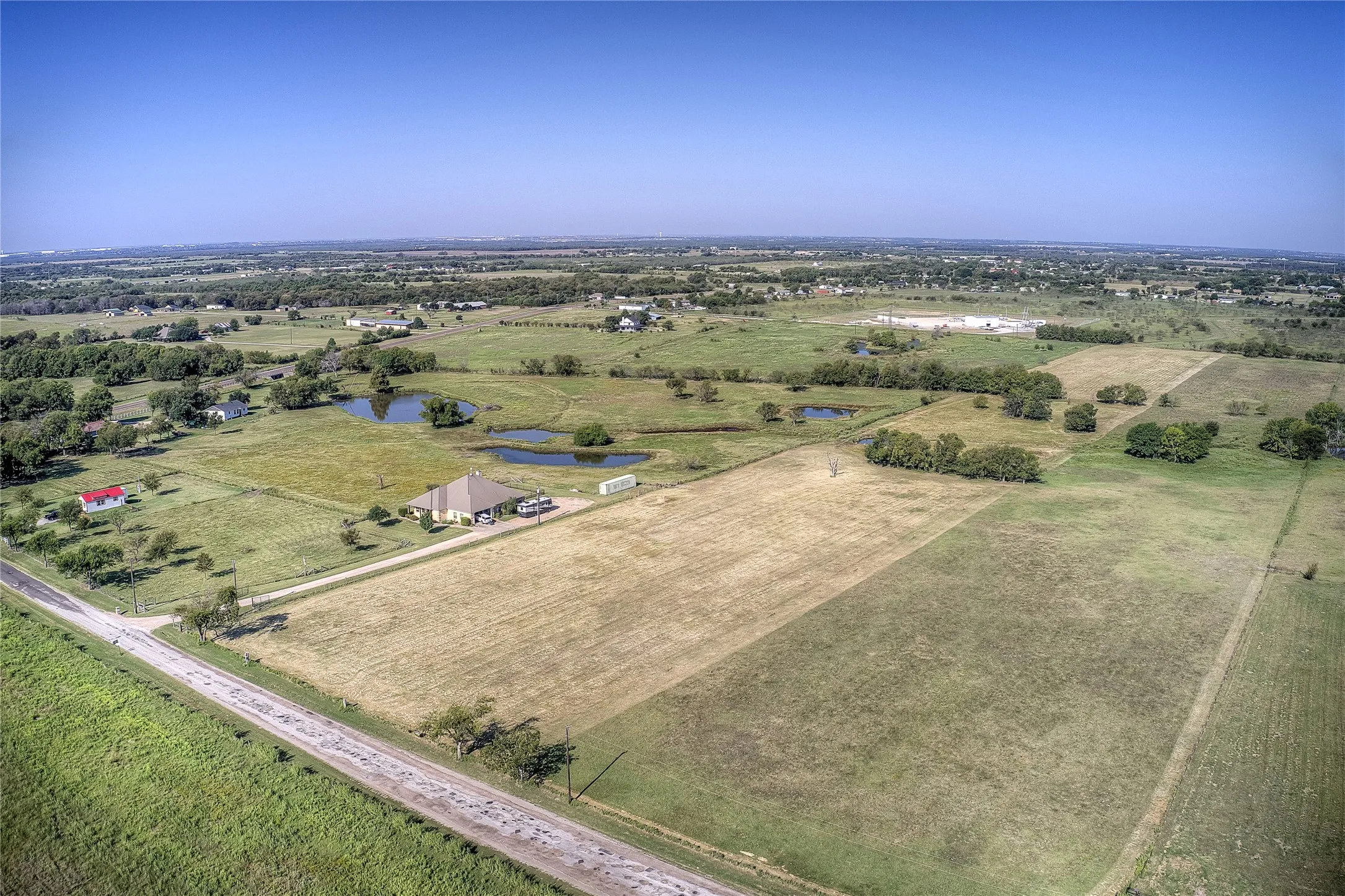 View of rural area with a nearby body of water