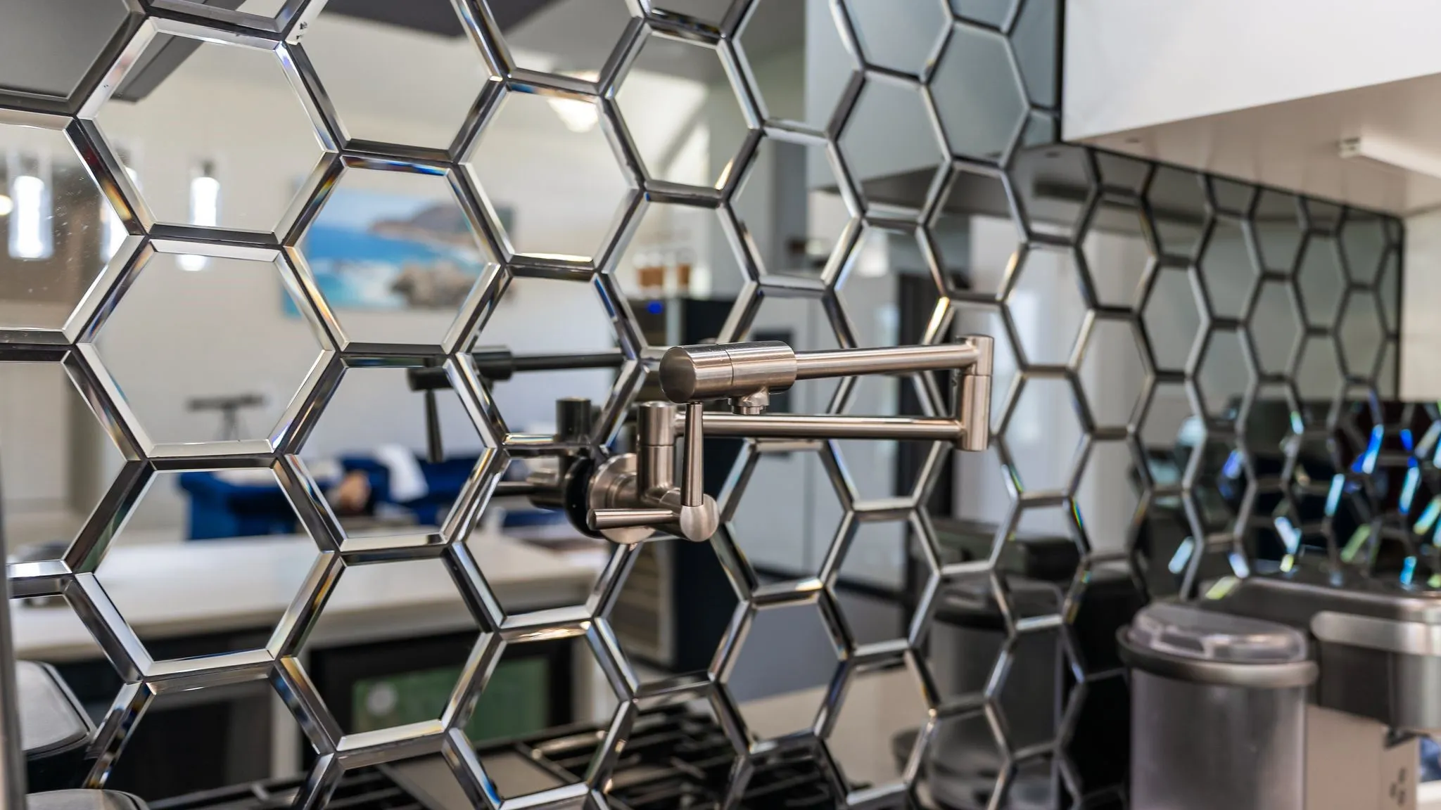 Wet bar with wine cooler, hexagon tile backsplash, and stylish entertaining features.