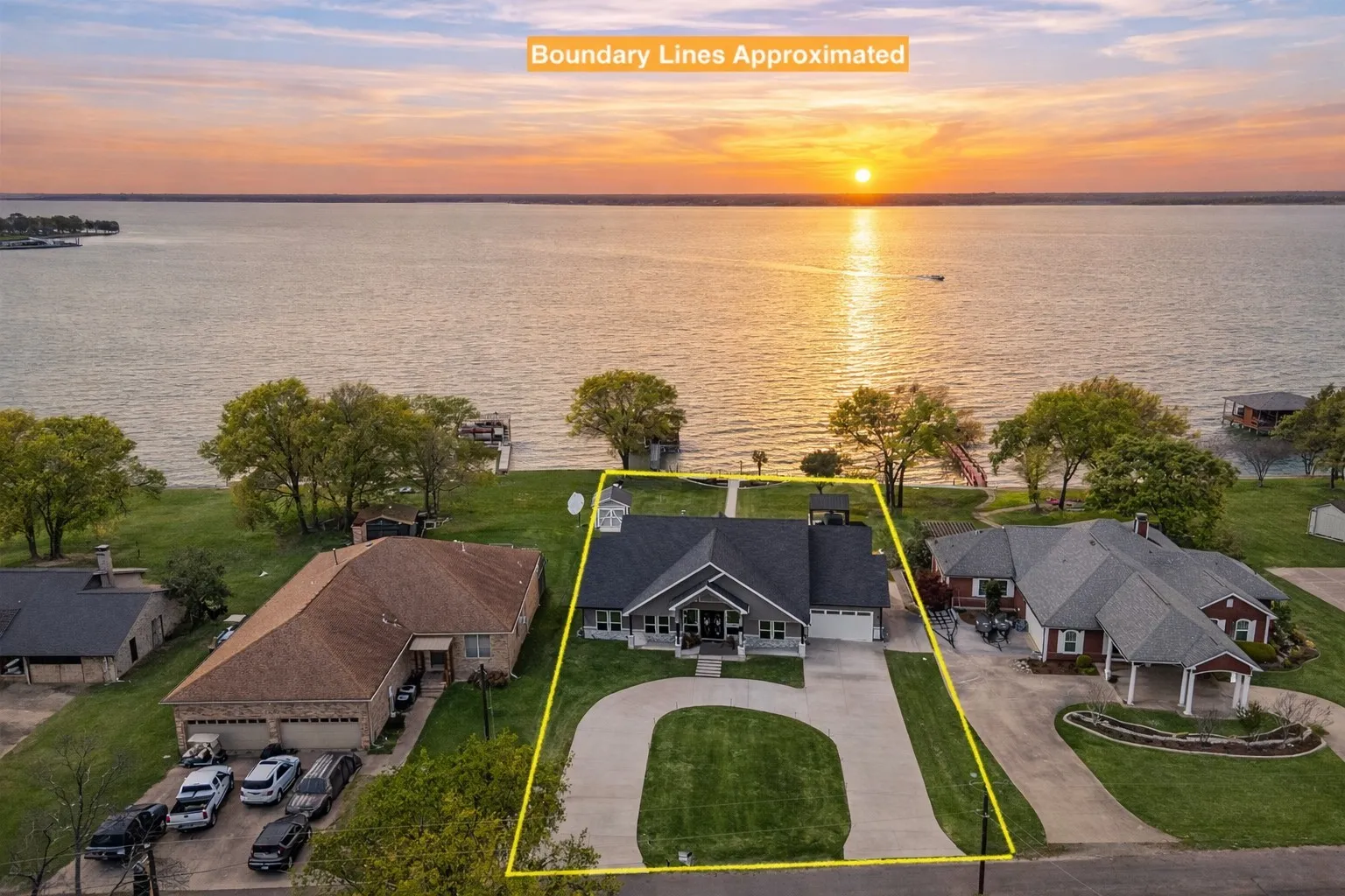 Lakefront aerial view showcasing open water frontage and peaceful North Texas lake living.