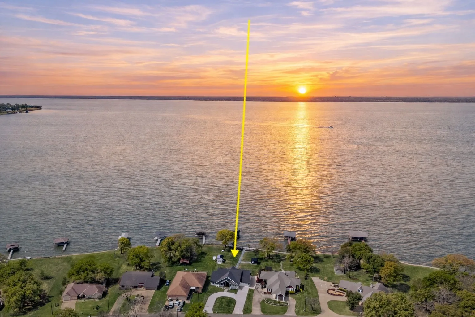 Sunset over Richland Chambers Lake with beautiful open water views from 13032 Rudys Way.