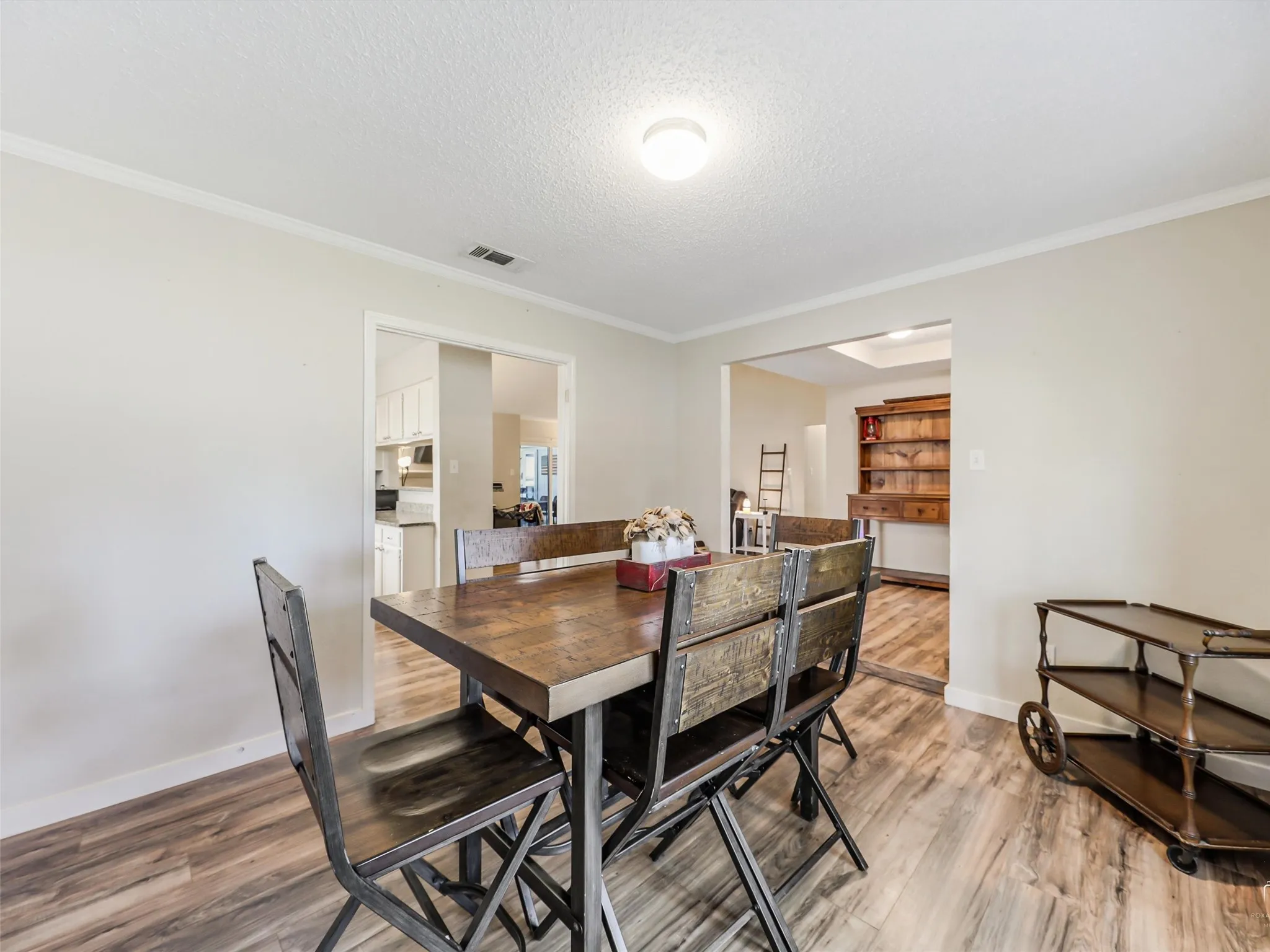 Open yet defined, this space flows effortlessly between the kitchen and living areas, making it easy to gather, host, and stay connected. It’s designed for both everyday moments and those occasions you’ll want to remember.