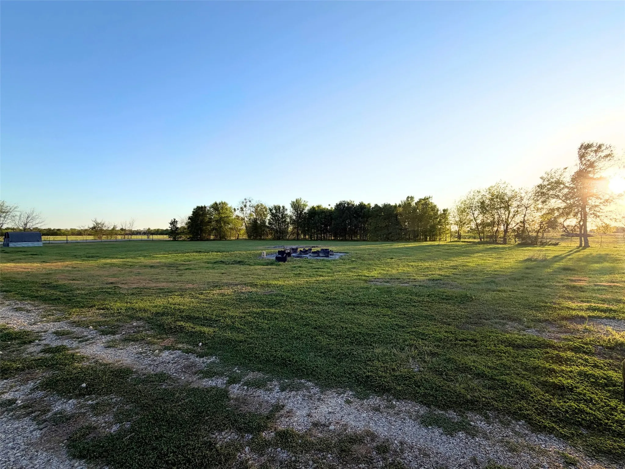 View of grassy yard with a rural view