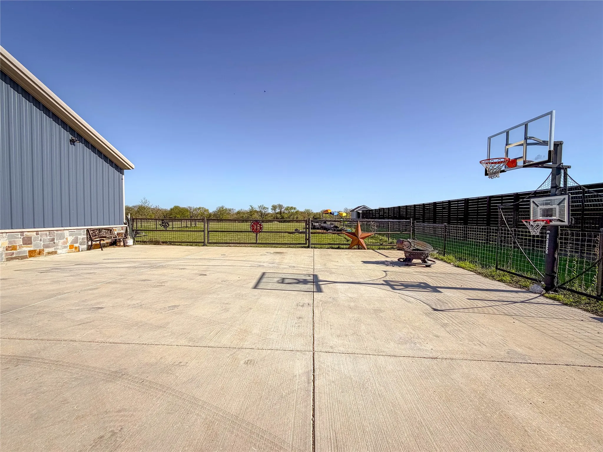 View of patio / terrace featuring community basketball court