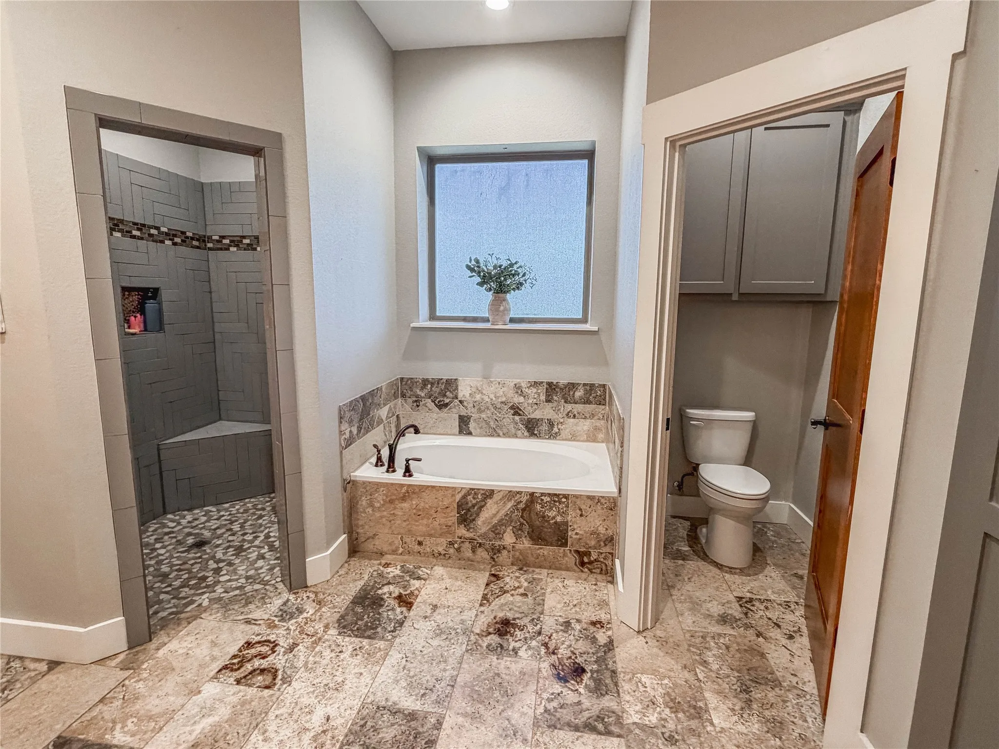 Bathroom with a bath and walk in shower