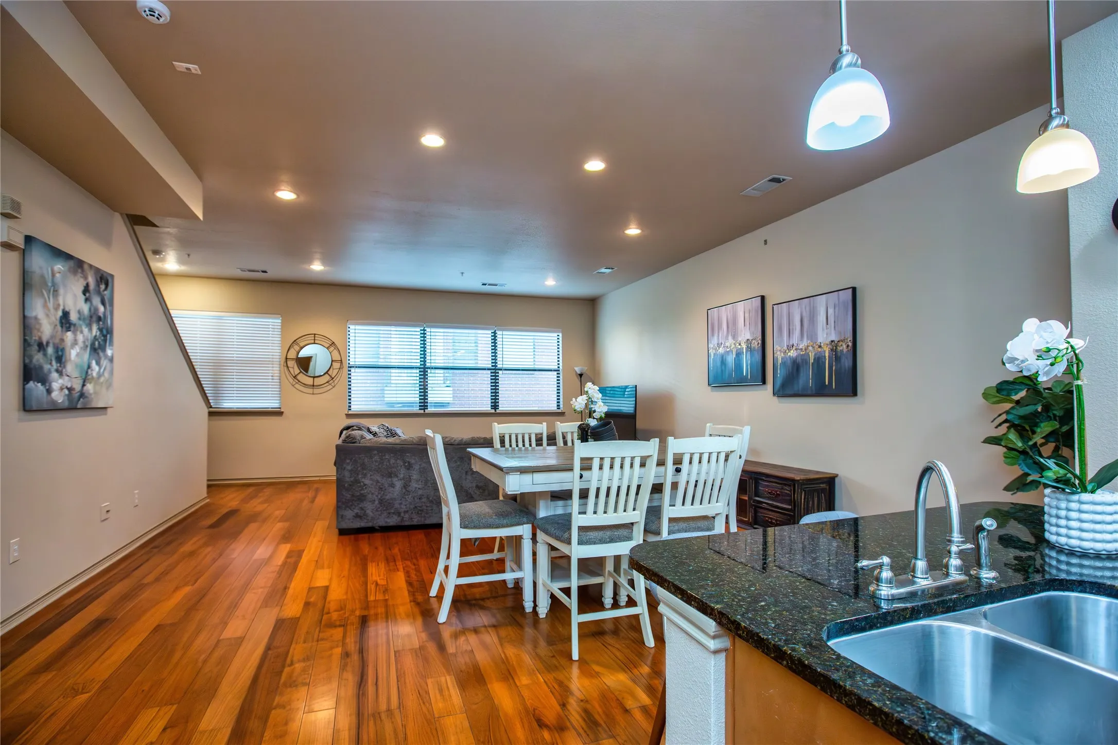 2nd Floor: Dining space with dark wood finished floors and recessed lighting