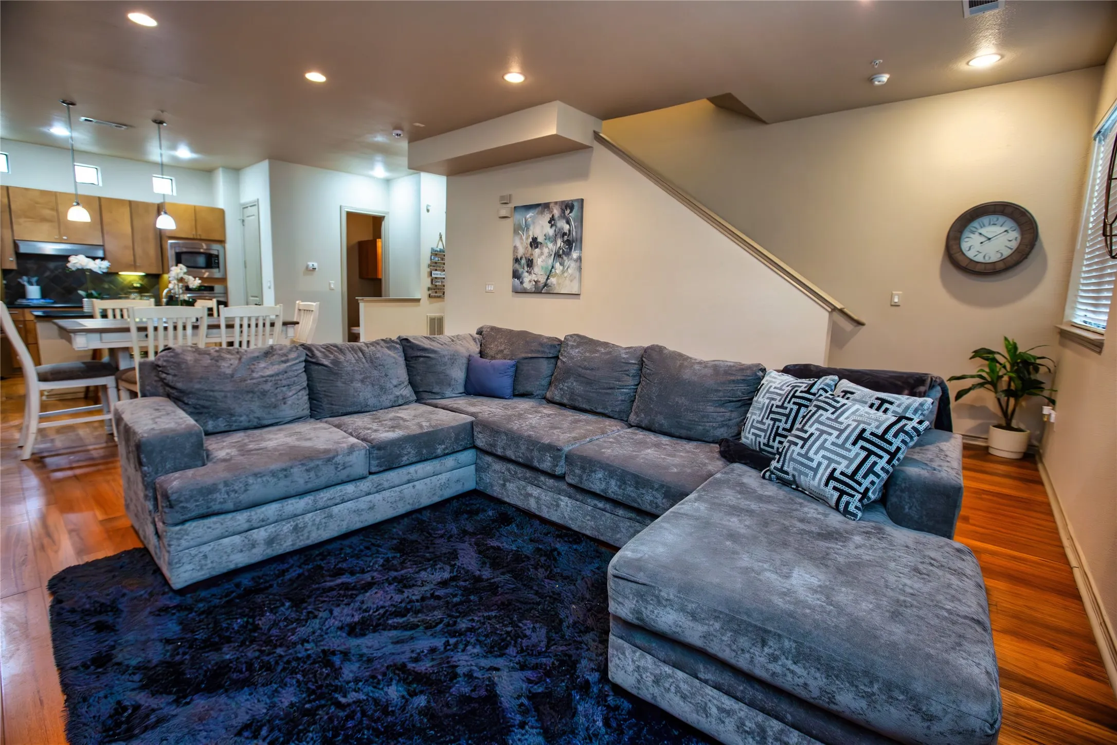 2nd Floor: Living room with wood  Finished floors and recessed lighting