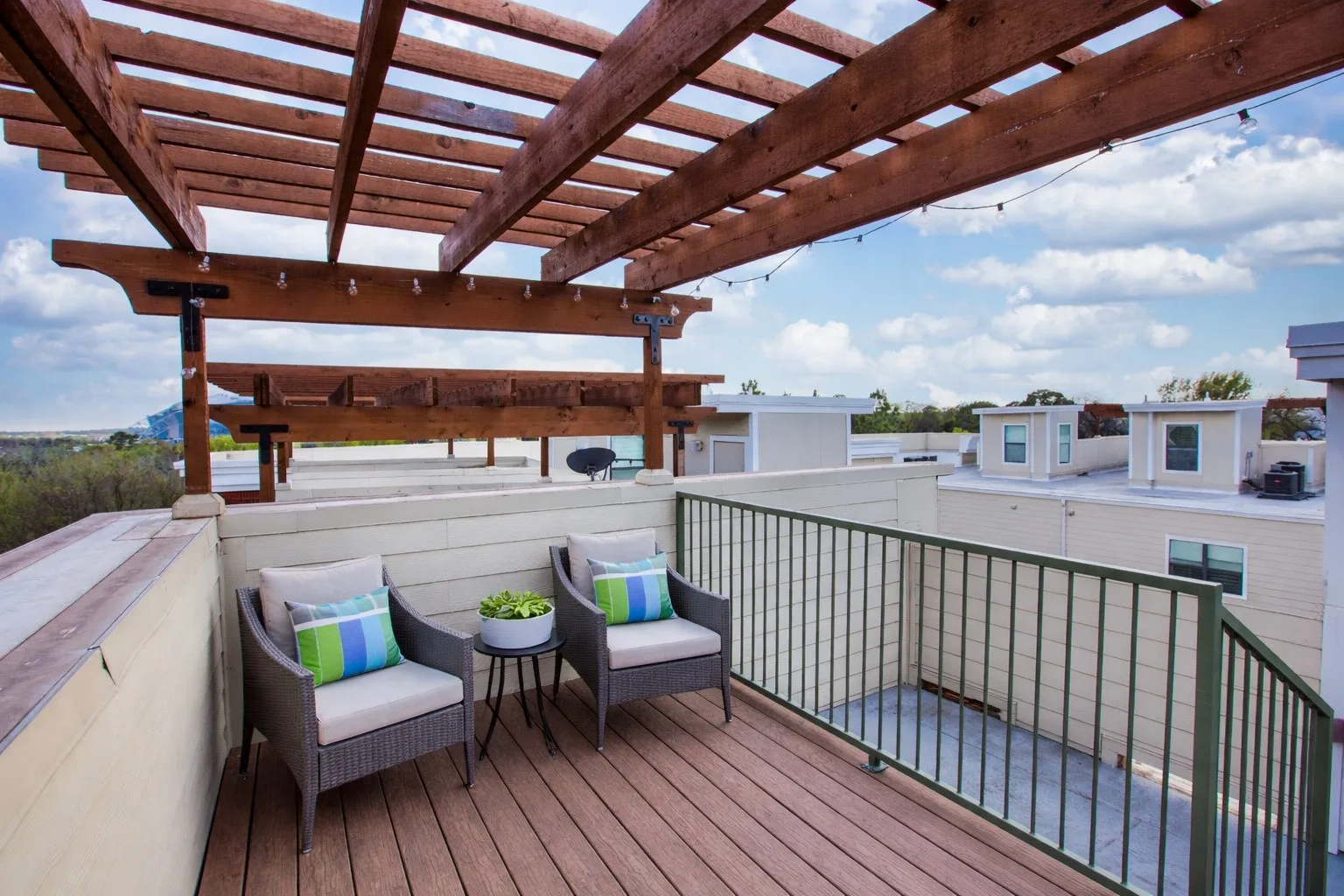 Wooden deck featuring a pergola