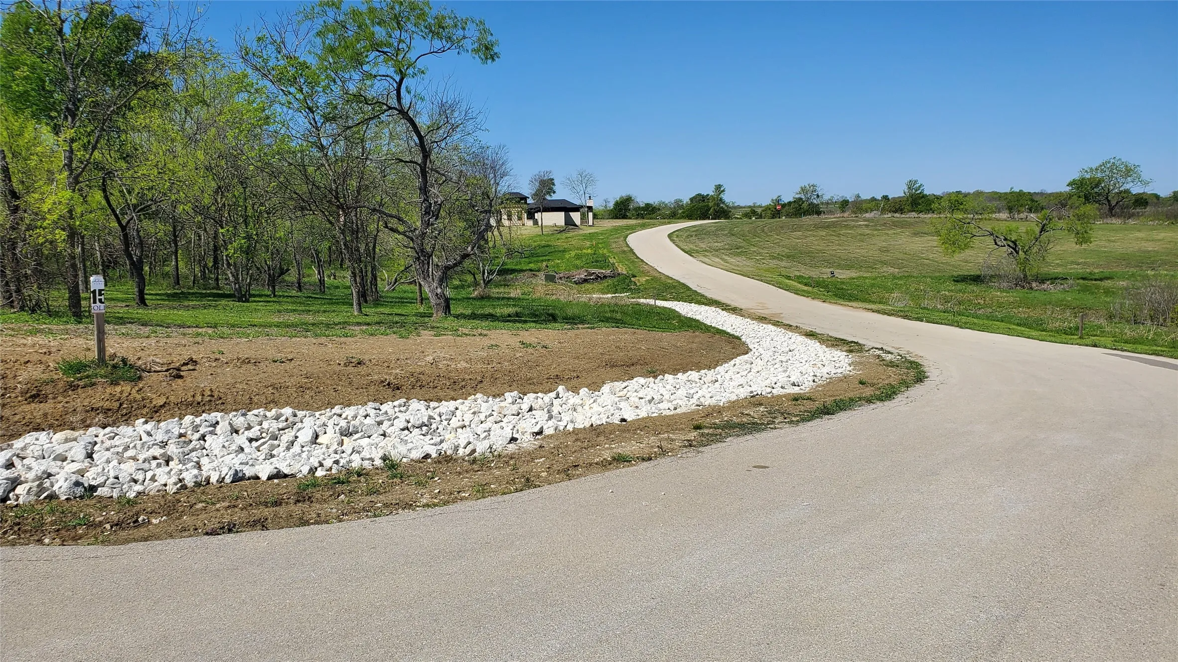In the distance one of 2 new homes recently built.
