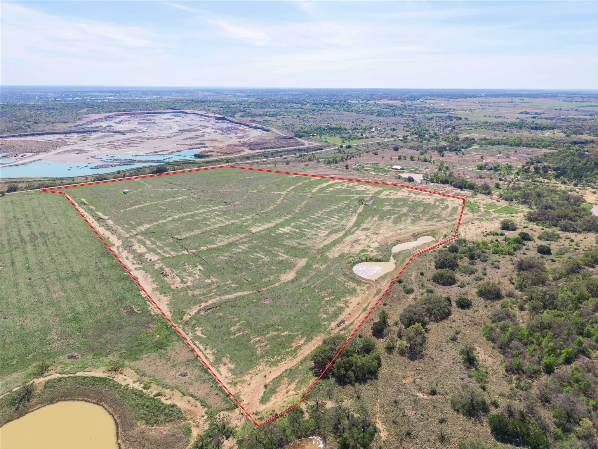 Overview of rural landscape featuring property boundaries highlighted