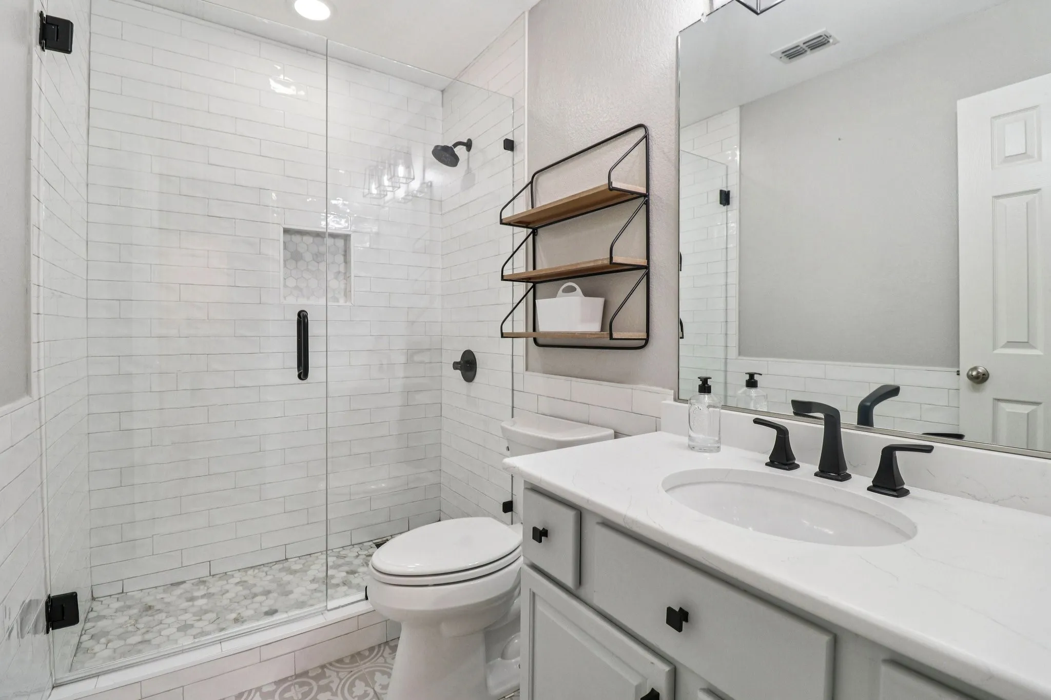 This bathroom has been completely remodeled and is stunning.