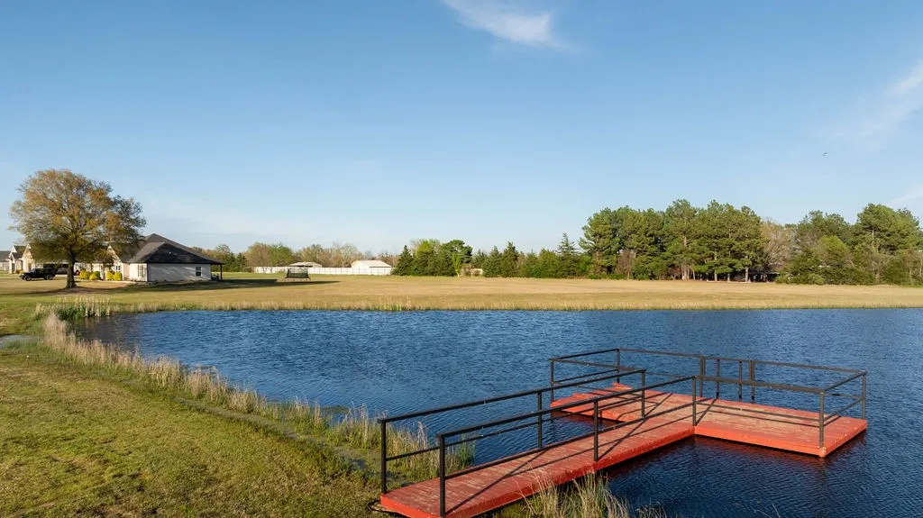 Shared pond in the subdivision stocked with fish.