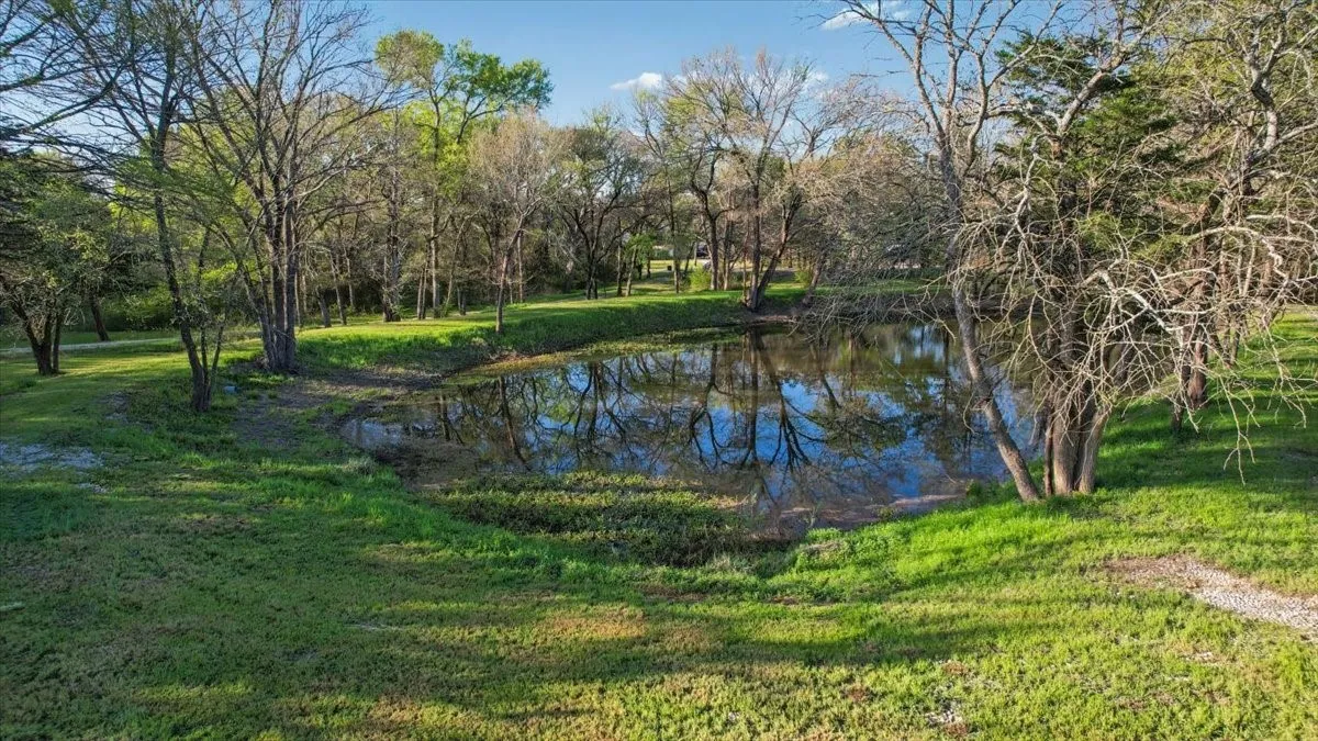 Gorgeous Pond stocked with catfish, bass & perch; rock road around pond