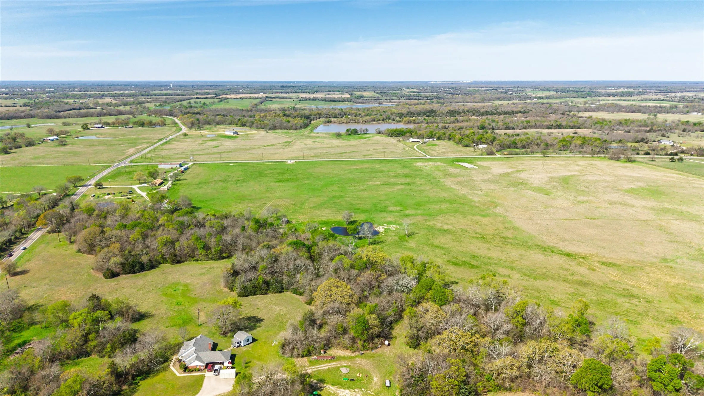 Overview of rural landscape featuring a large body of water