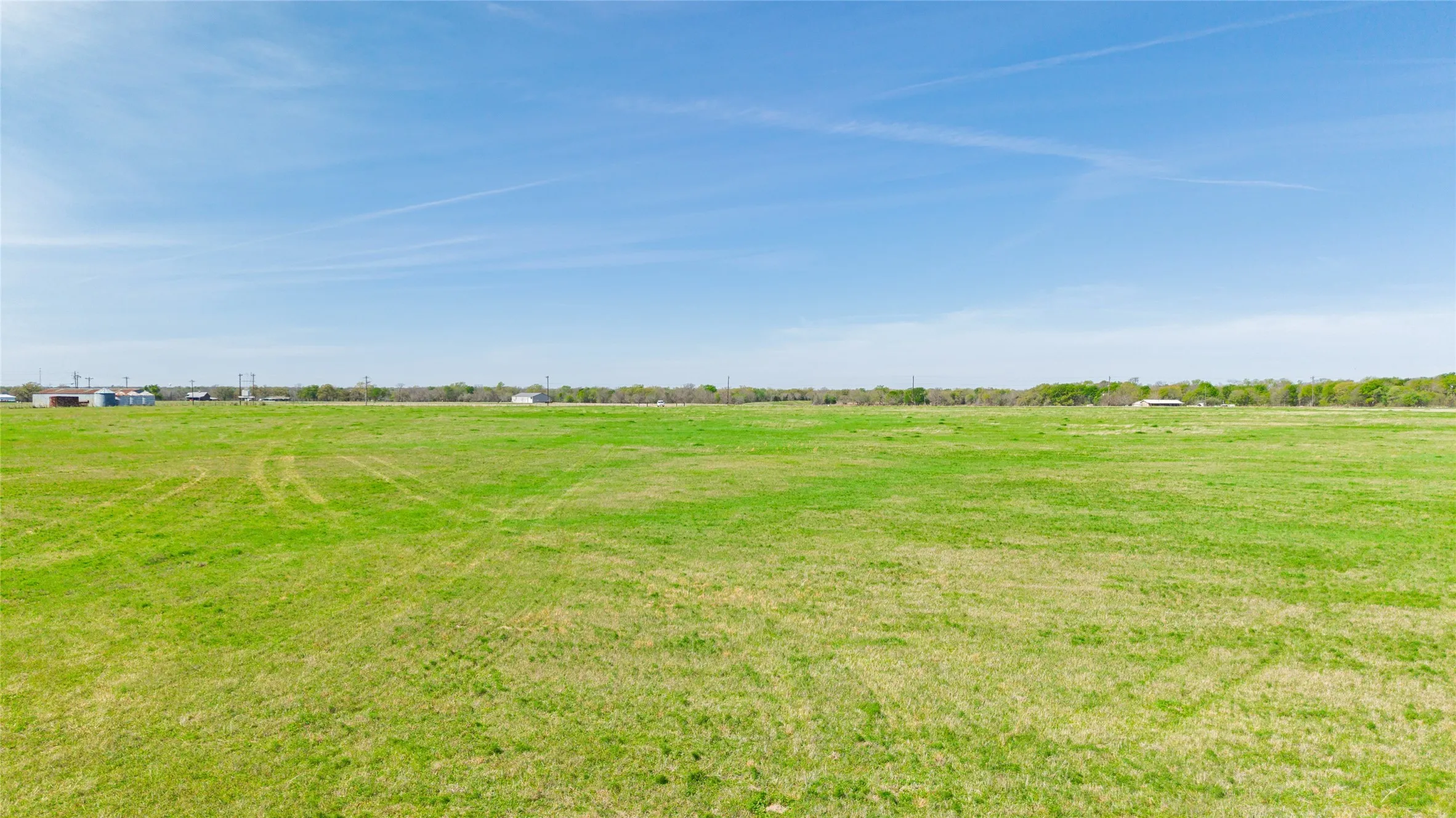 View of yard with a rural view