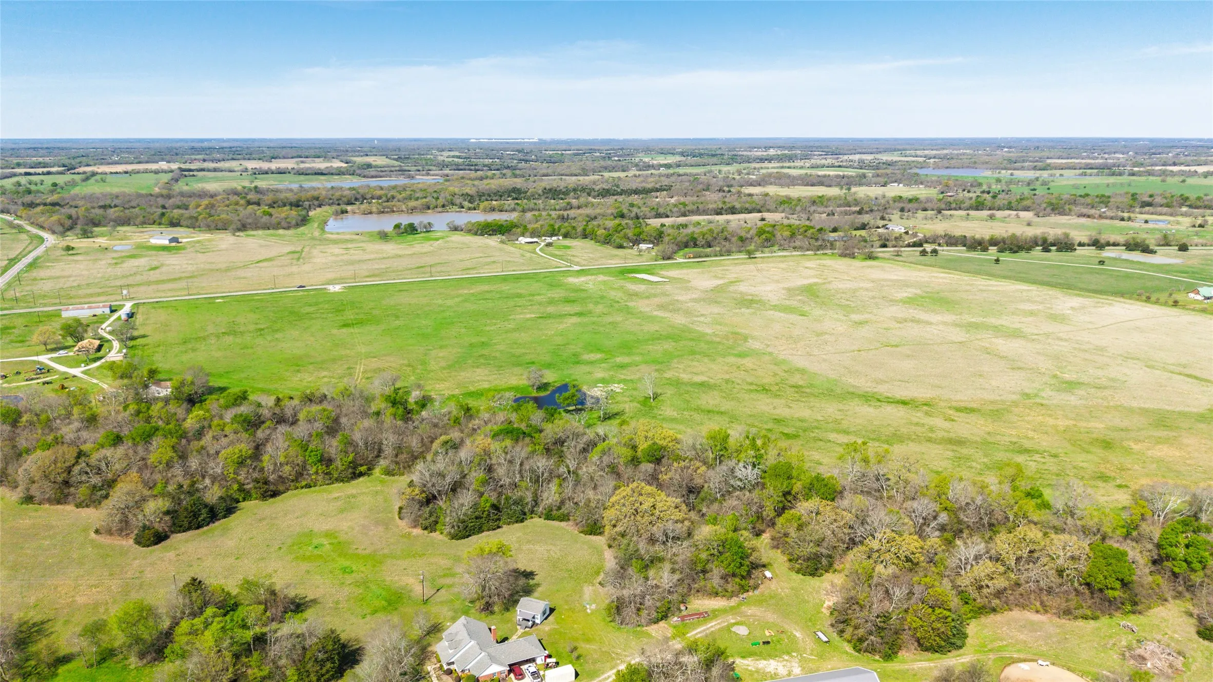 View of rural area with a nearby body of water