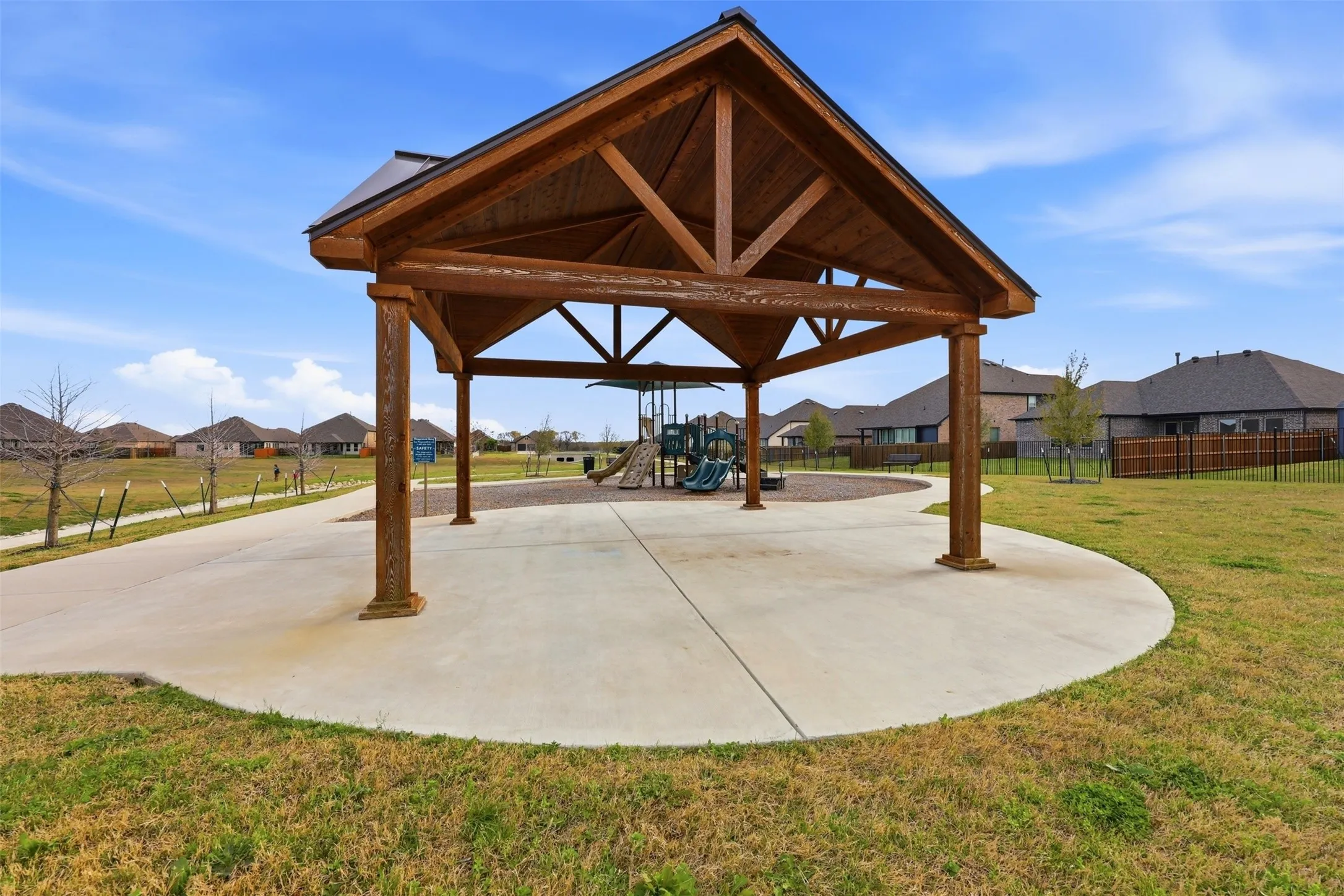 View of community with a residential view and a patio area