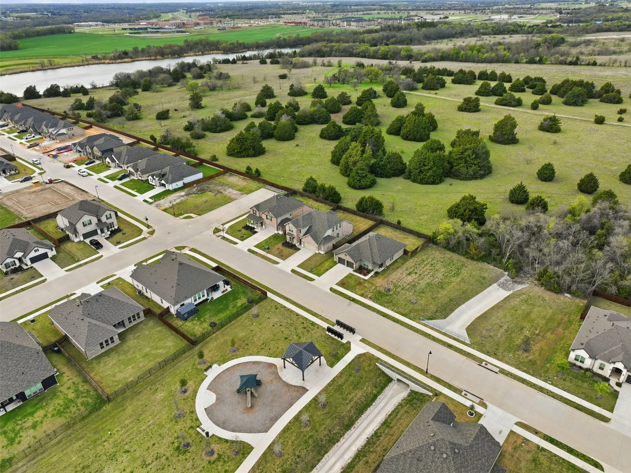 Aerial view of residential area with a nearby body of water