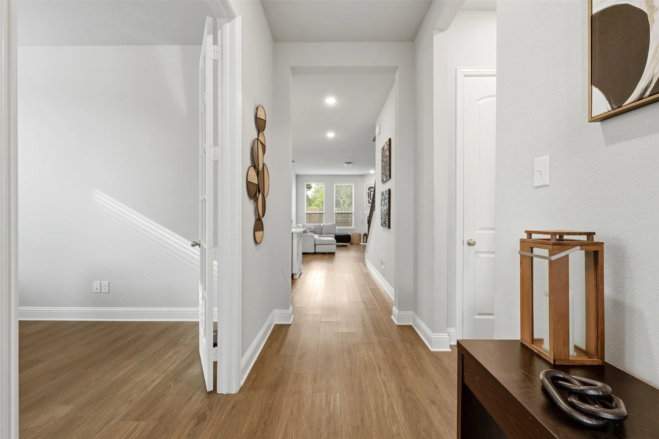 Corridor featuring recessed lighting and wood finished floors