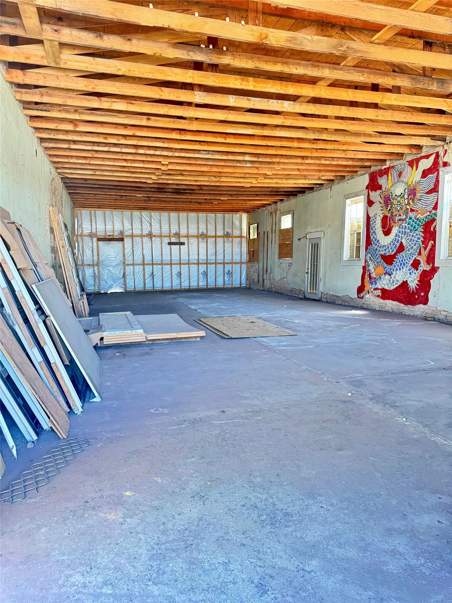 View from the front door looking into the back wall of the building.