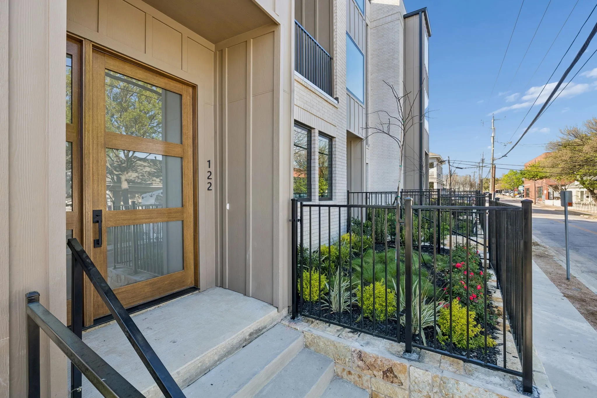 View of exterior entry featuring board and batten siding