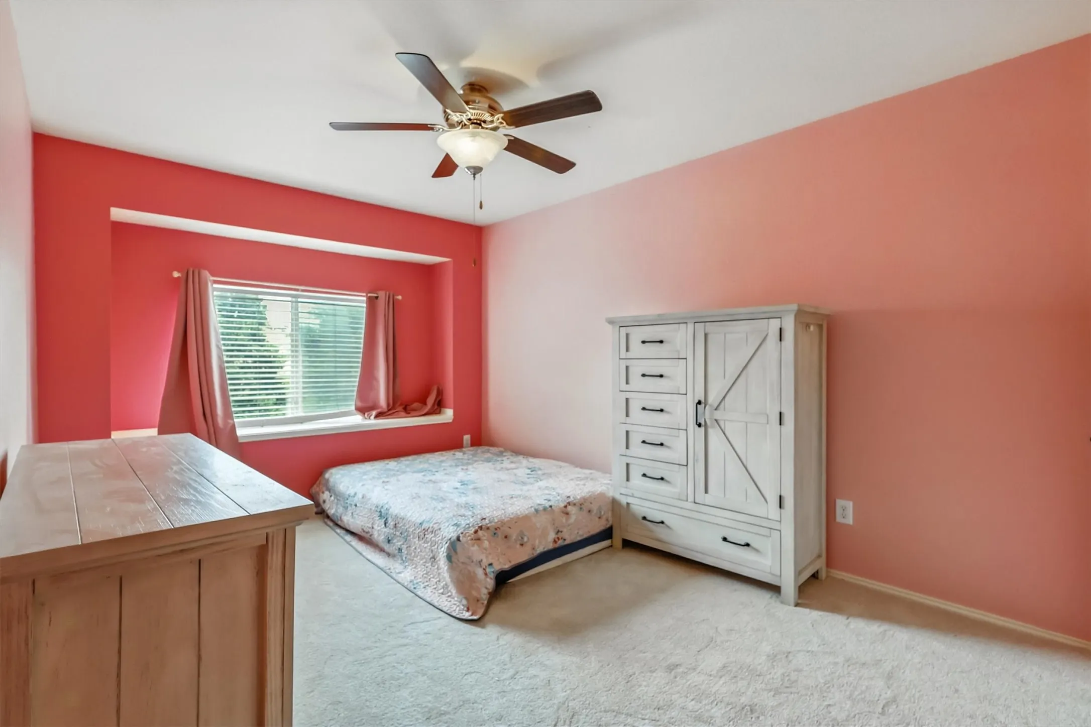 Bedroom 2 featuring carpet flooring and a ceiling fan