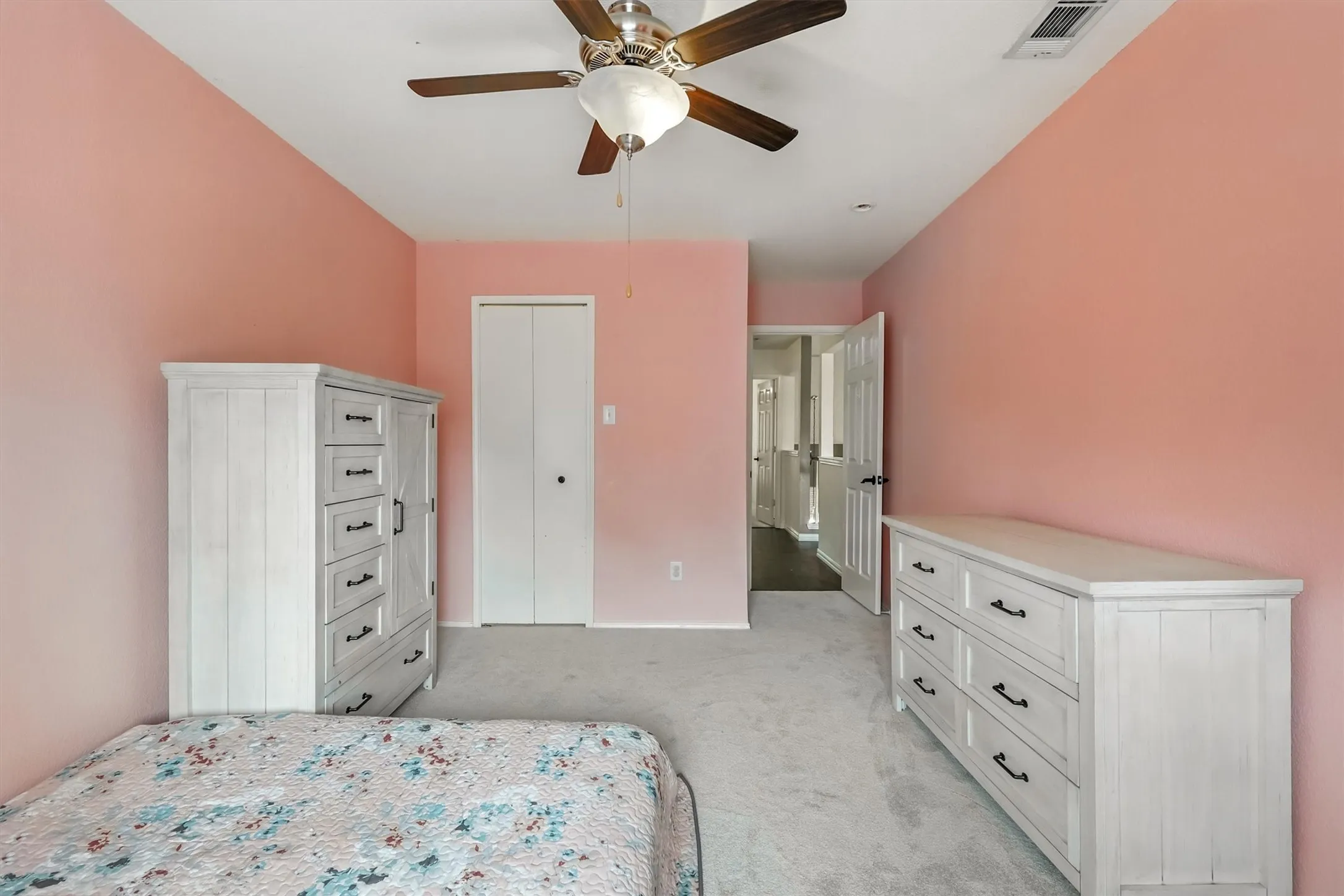 Bedroom 2 featuring light carpet and ceiling fan