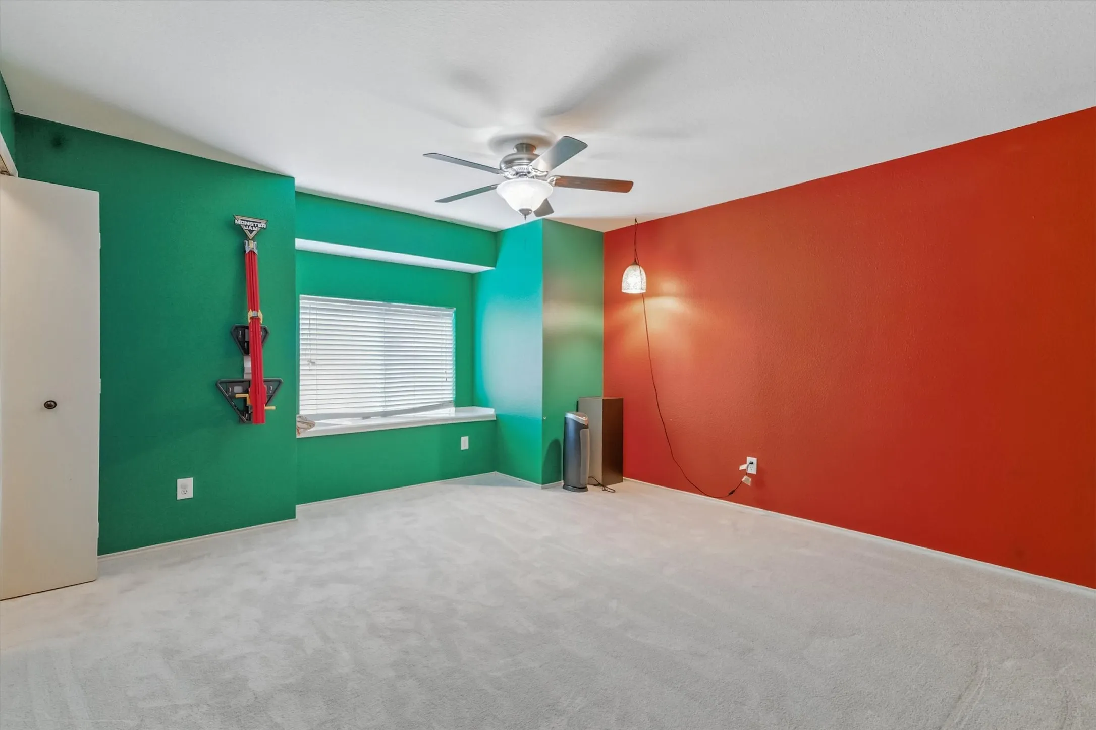 Bedroom 5 featuring ceiling fan and carpet flooring