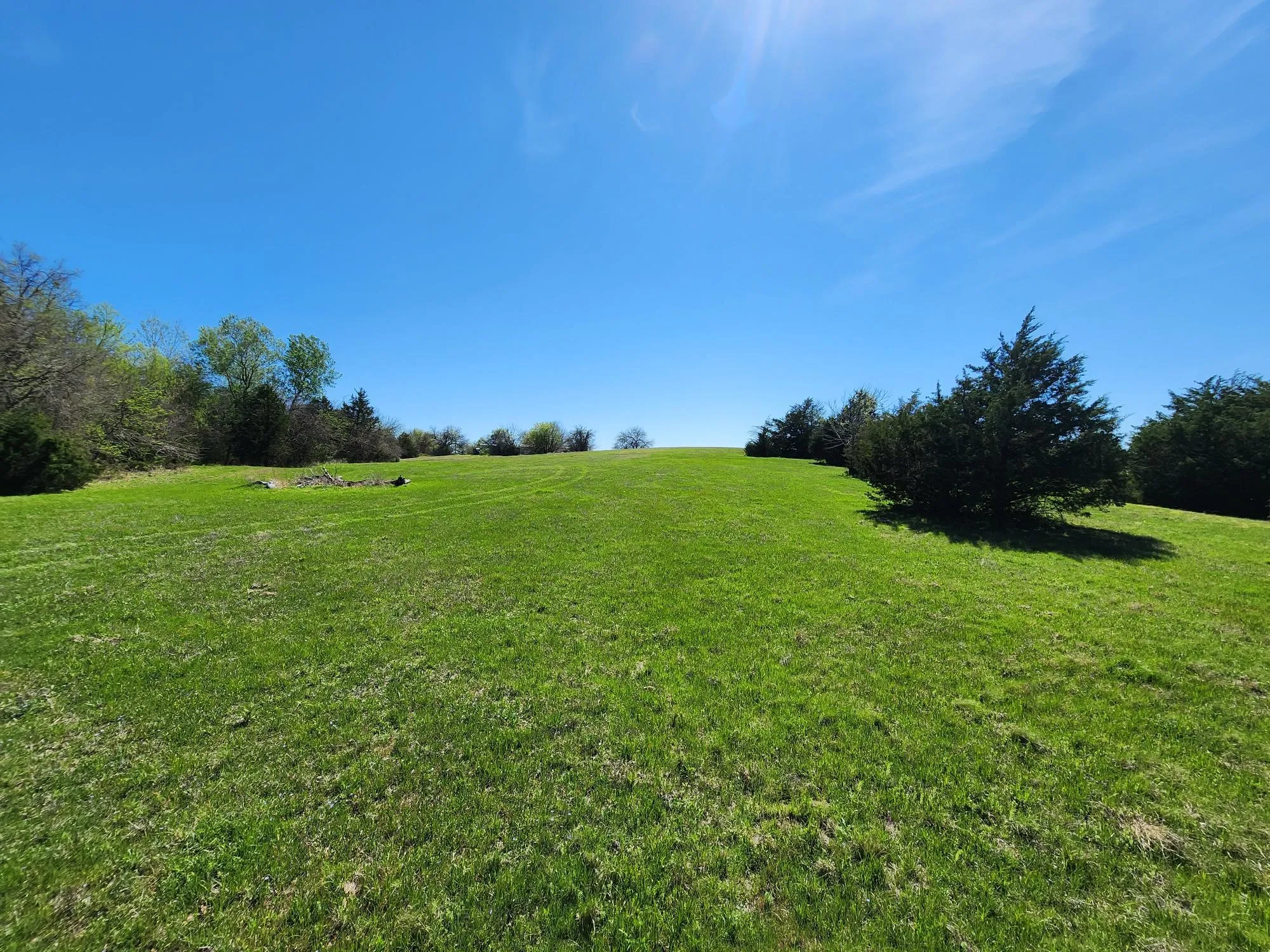 View of green lawn featuring a view of countryside