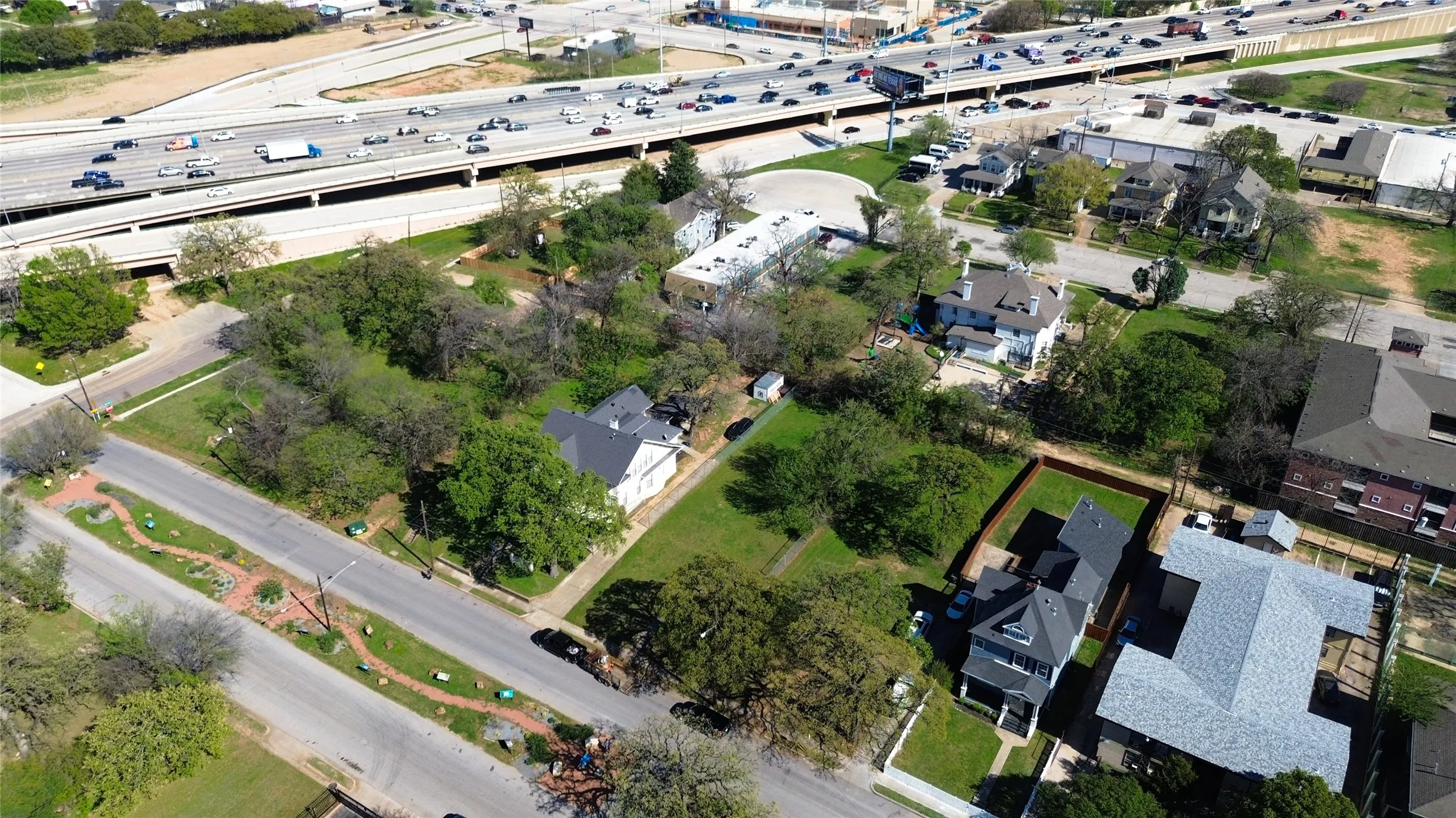 Aerial view of residential area with a main thoroughfare