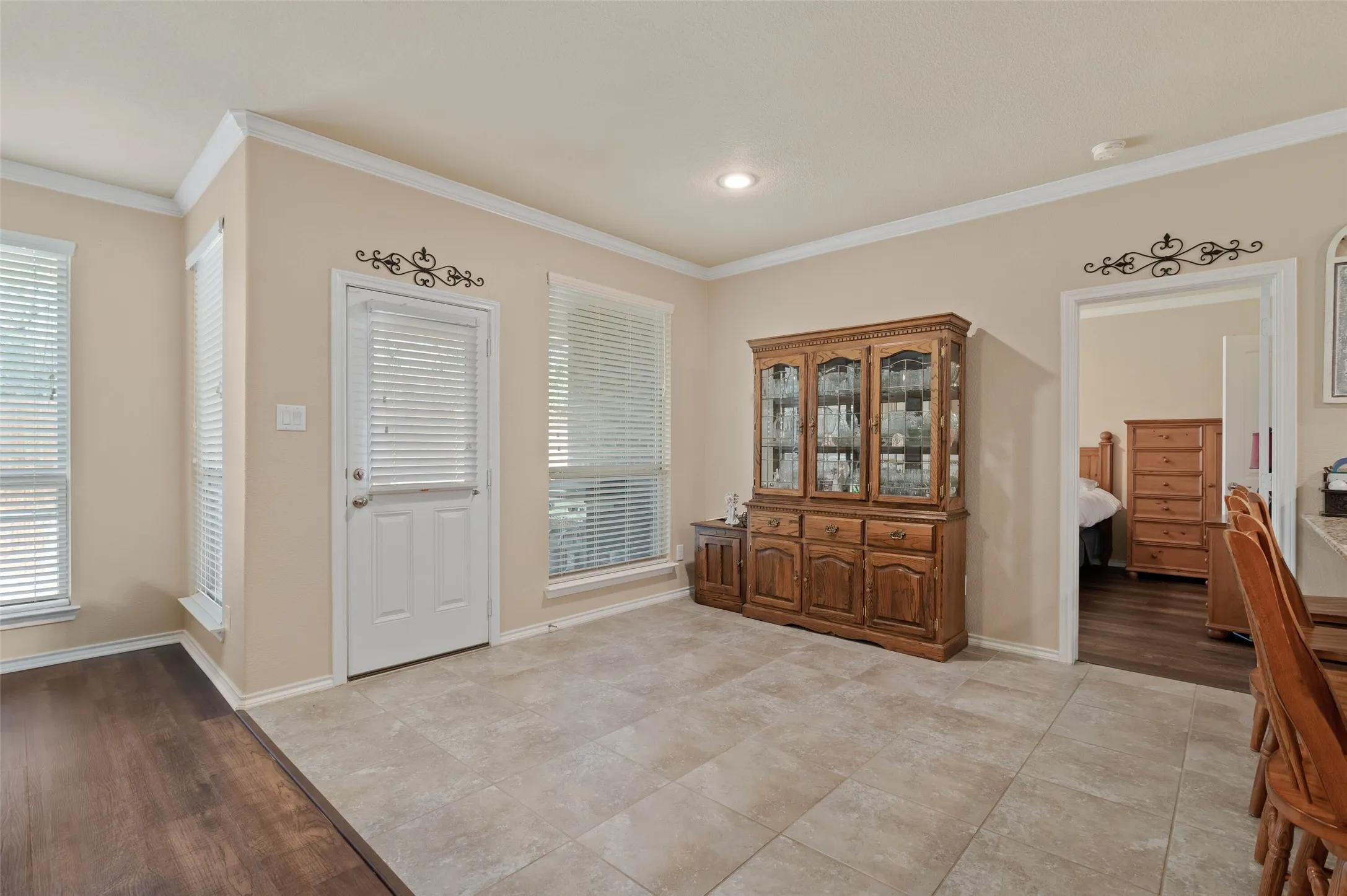 Imagine sharing a meal as you look out to all the greenery of the tree lined backyard.