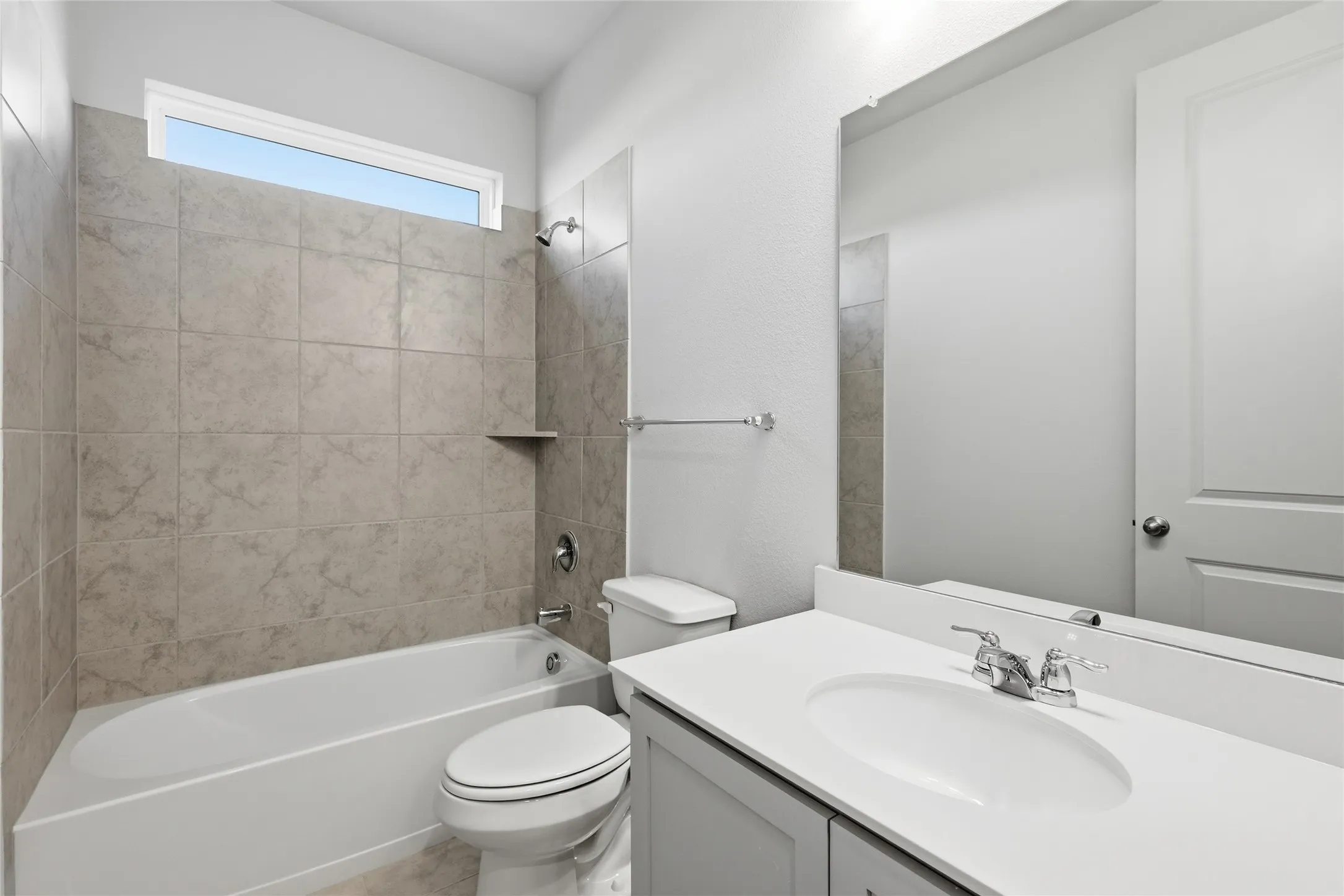 Full bathroom with vanity and bathing tub / shower combination