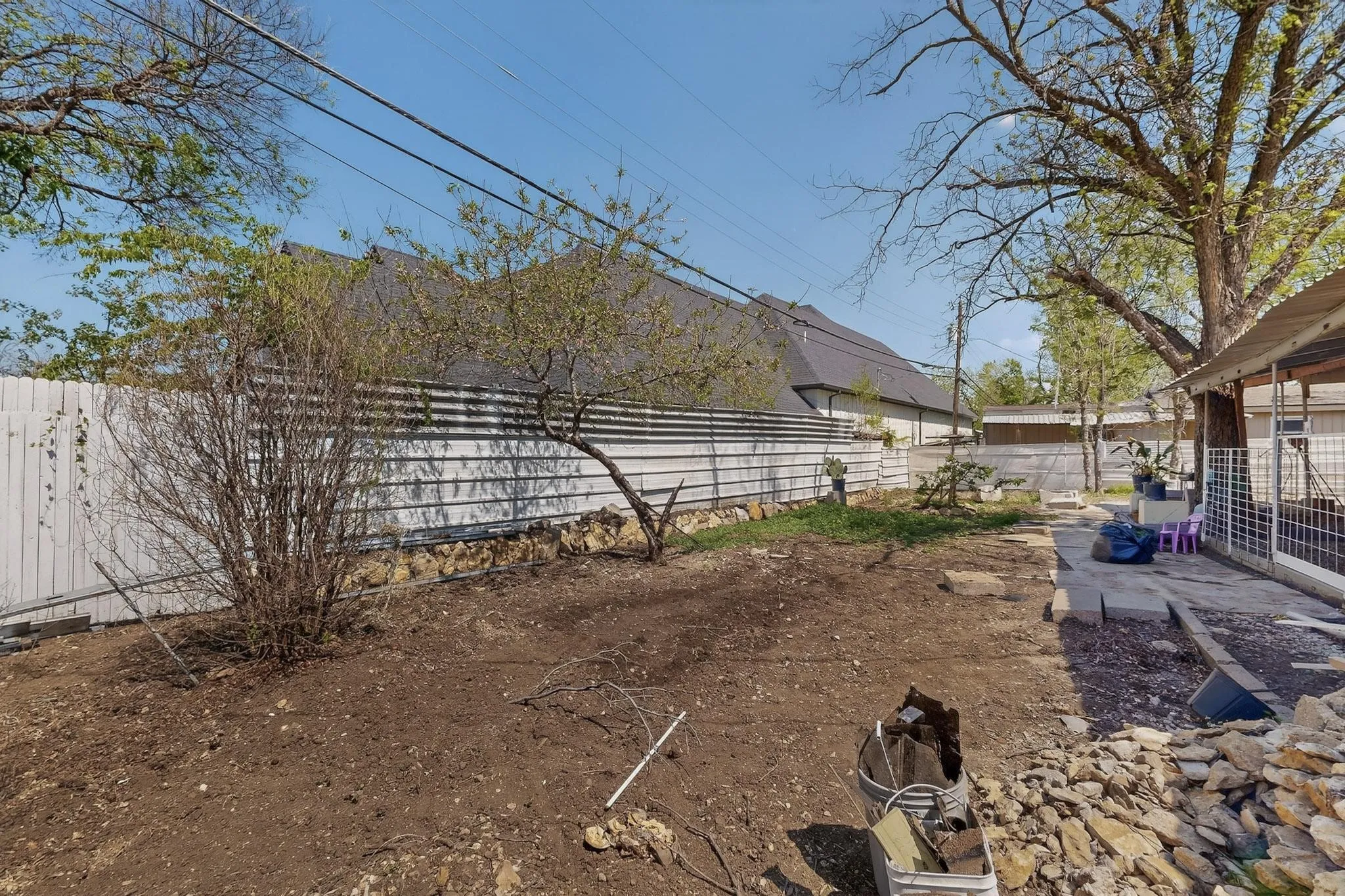 View of fenced backyard