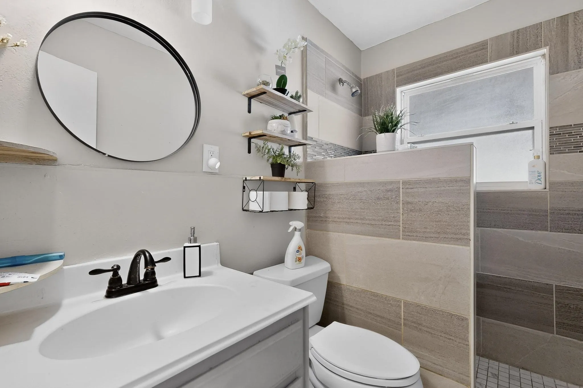 Full bathroom with vanity and a walk in shower