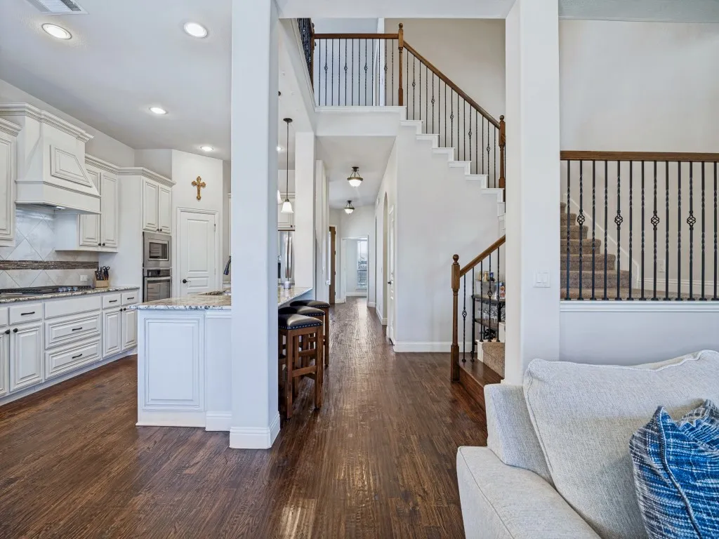 Entryway featuring dark wood finished floors and recessed lighting