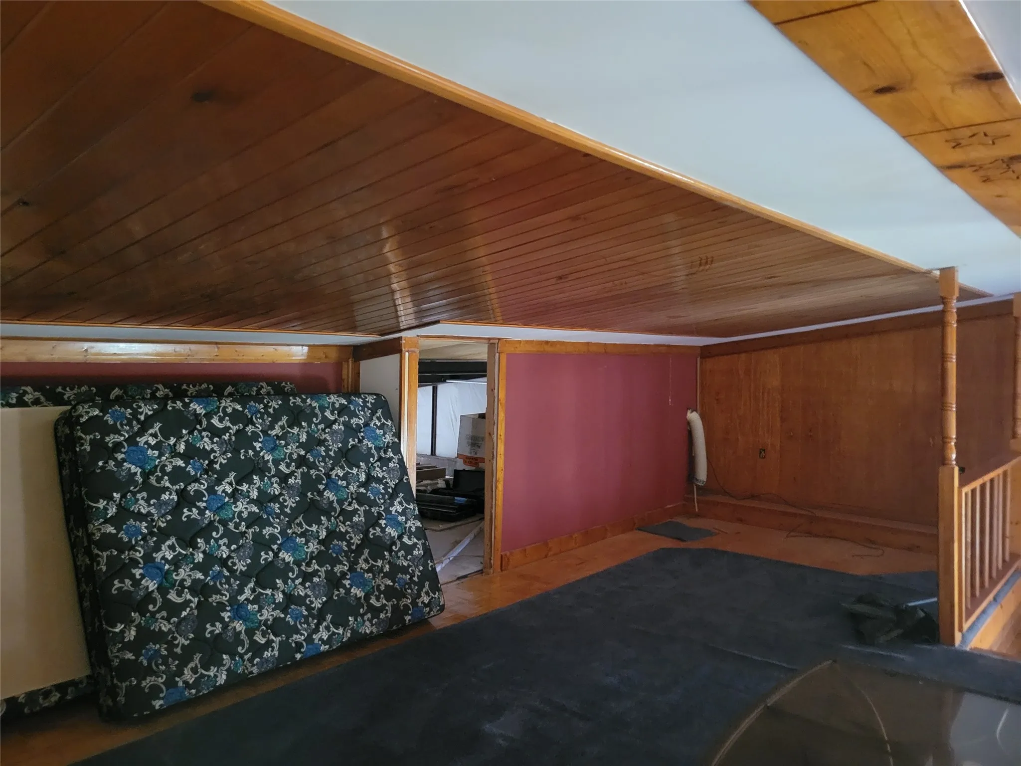Additional living space featuring wood ceiling
