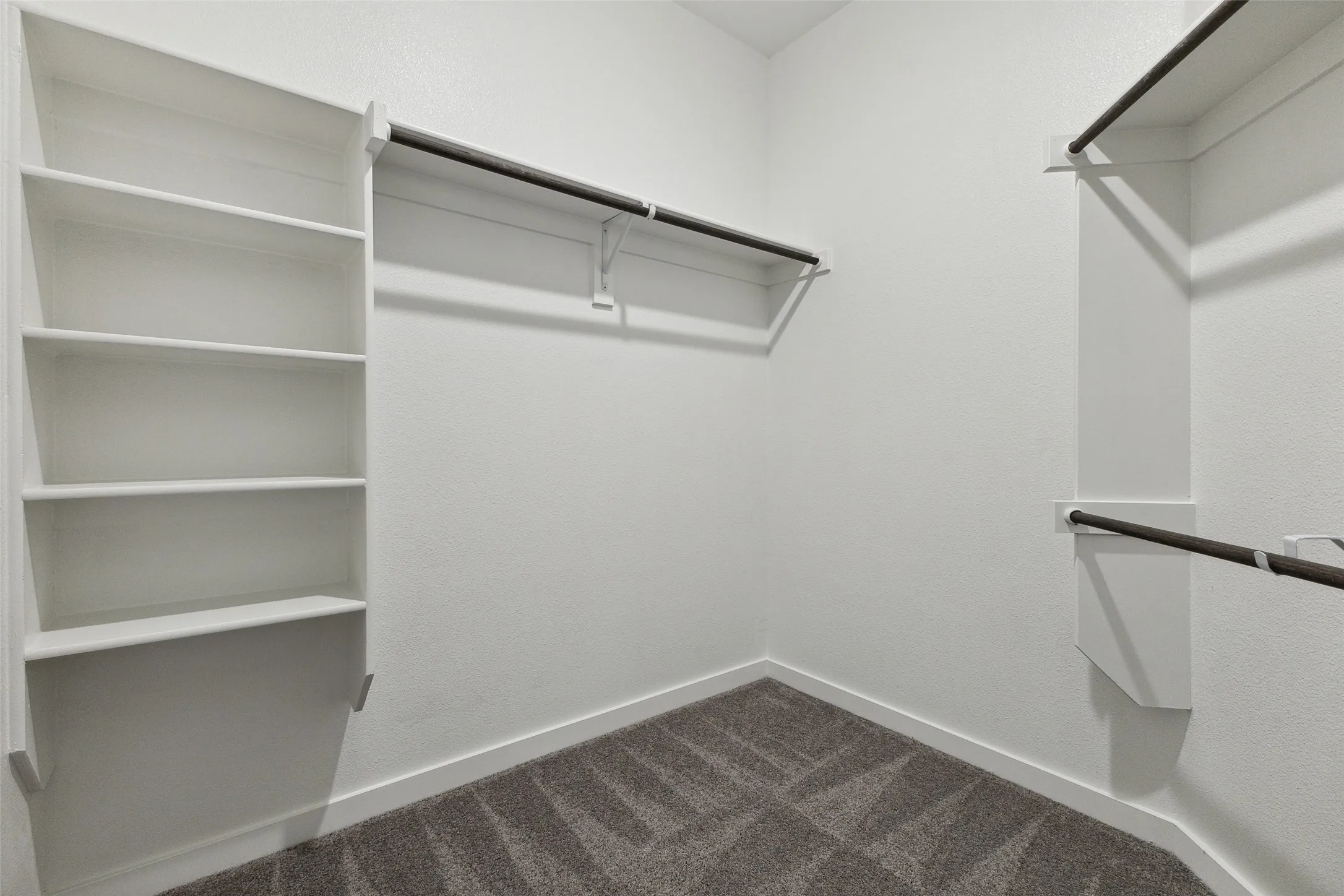 Primary Closet in the Amber home plan by Trophy Signature Homes – REPRESENTATIVE PHOTO