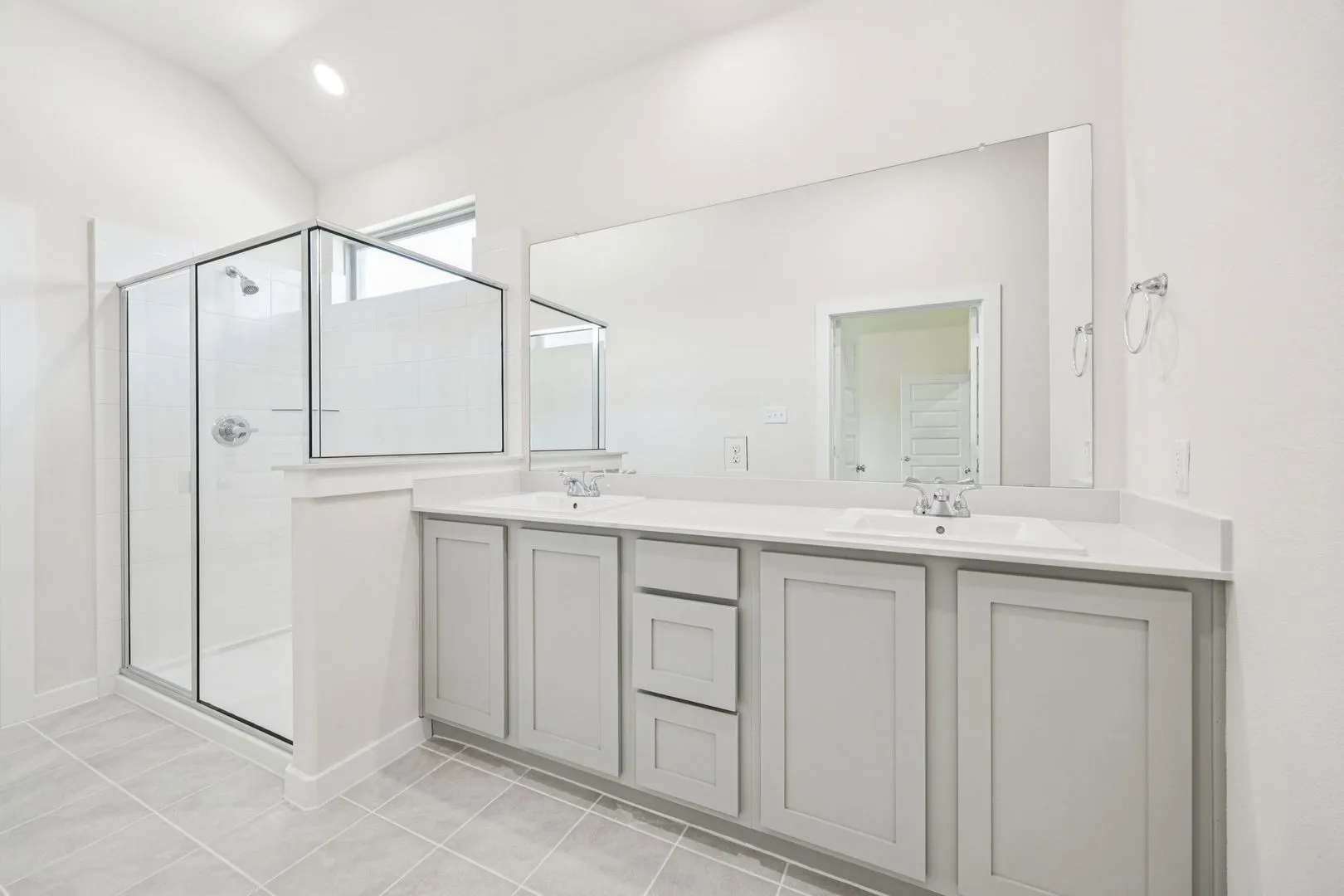 Primary Bathroom in the Claret home plan by Trophy Signature Homes – REPRESENTATIVE PHOTO