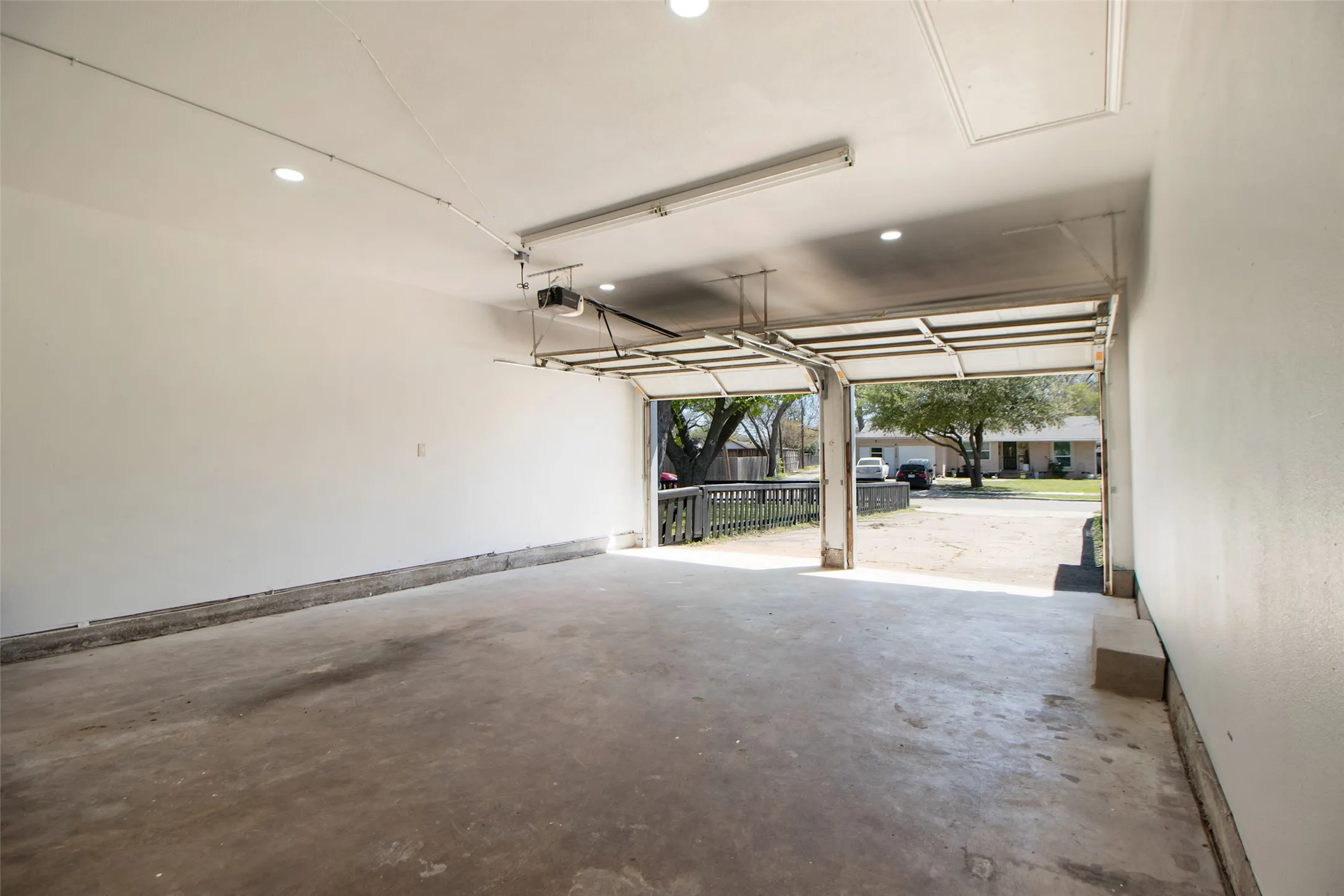 Garage featuring recessed lighting