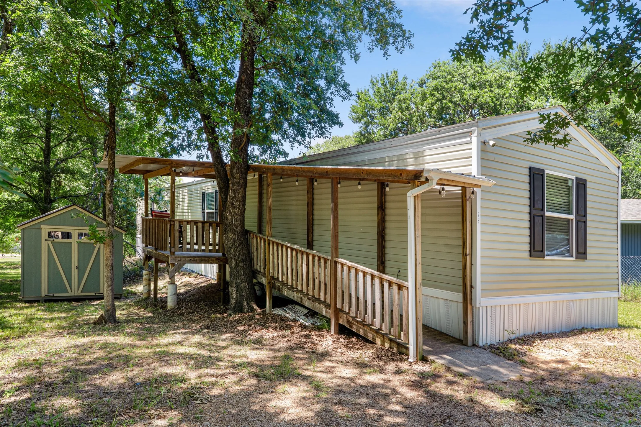 Mobile Home For Sale in Henderson County , 237 Wildwind Street, Gun Barrel City, Texas 75156, 3 Bedrooms, 2 Bathrooms, Garage spaces, 1,064 Sqft, built in 2020, Price $118,000, mls#21216976, Real Estate Agent in Gun Barrel City, Homes For Sale in Henderson county, Homes For Sale in Gun Barrel City, Realtor in Gun Barrel City Texas, Real Estate Brokerage Independent Realty Texas, Luminita Cordes Realtor