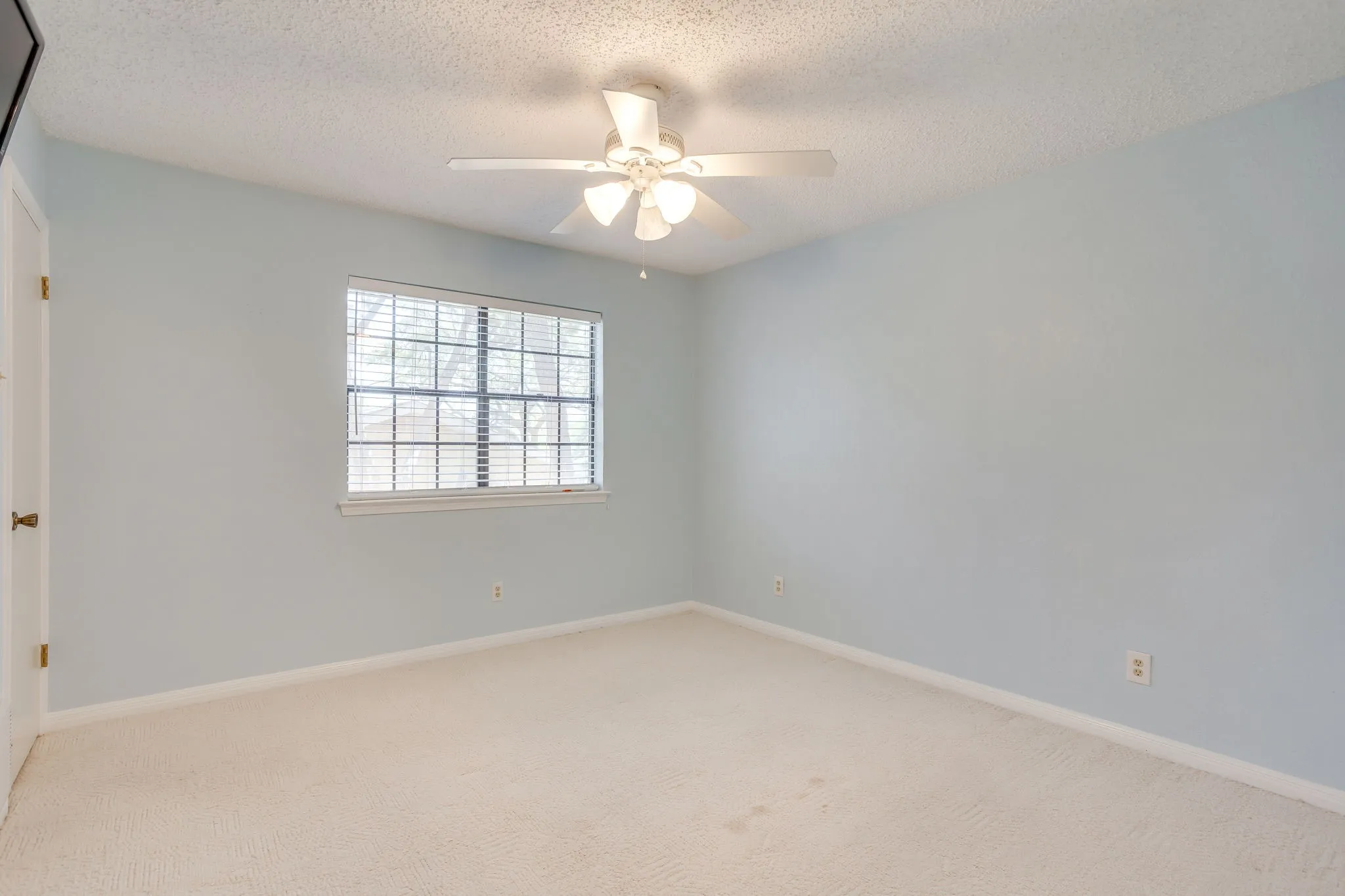 Bedroom separate from Primary bedroom with a Walk-in Closet.