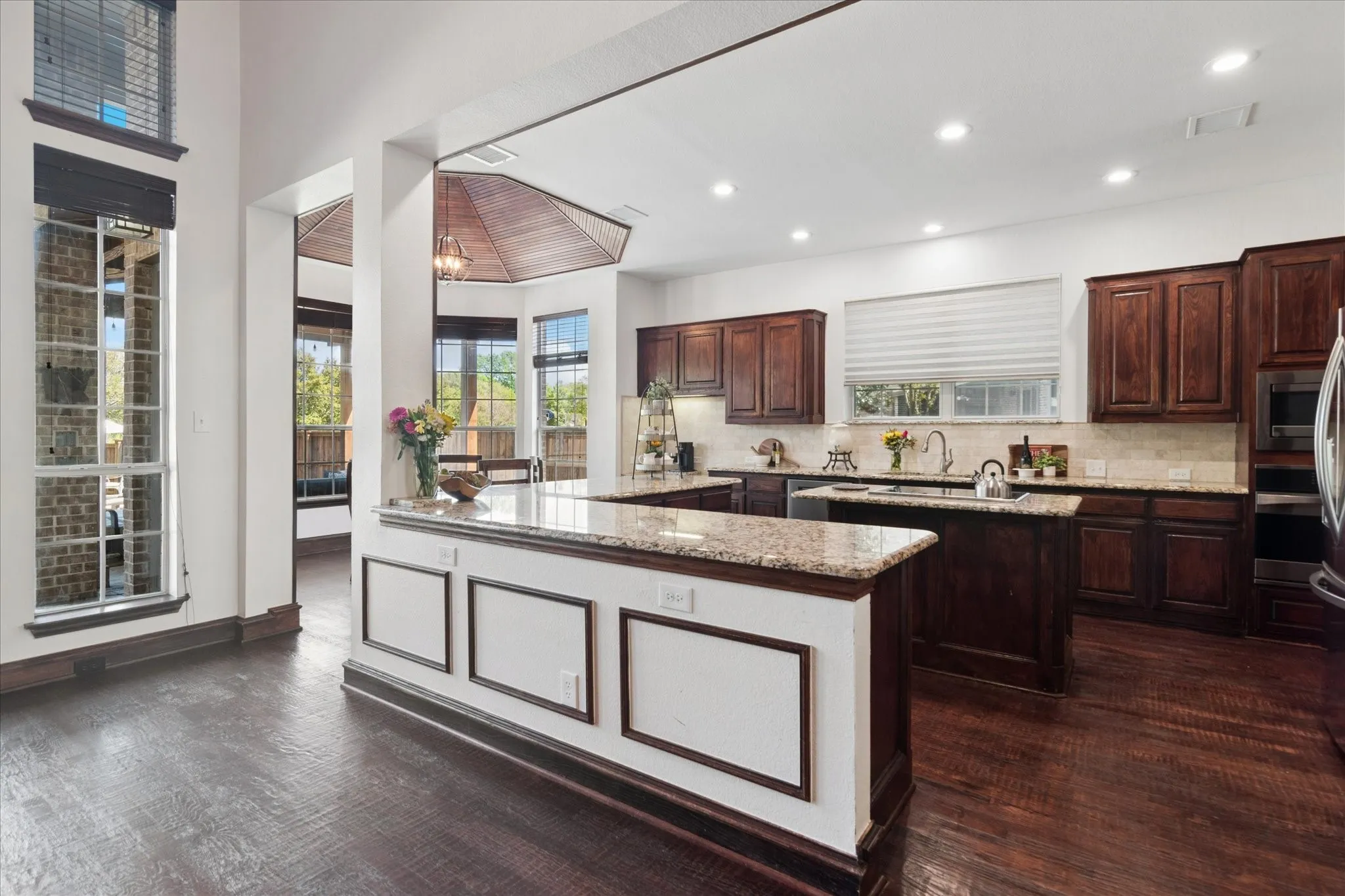 Chef’s kitchen with a quaint breakfast nook.