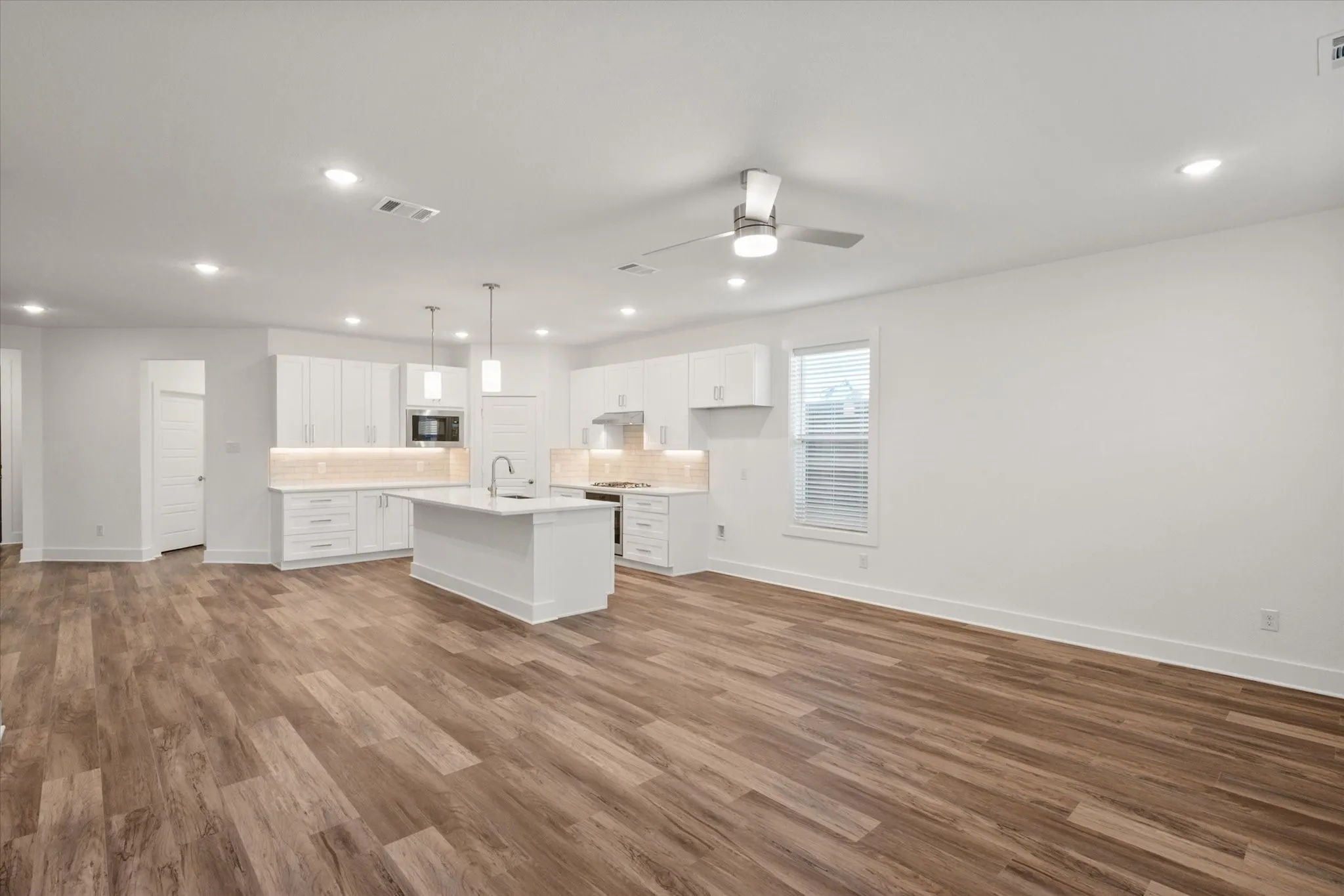 View of kitchen from living