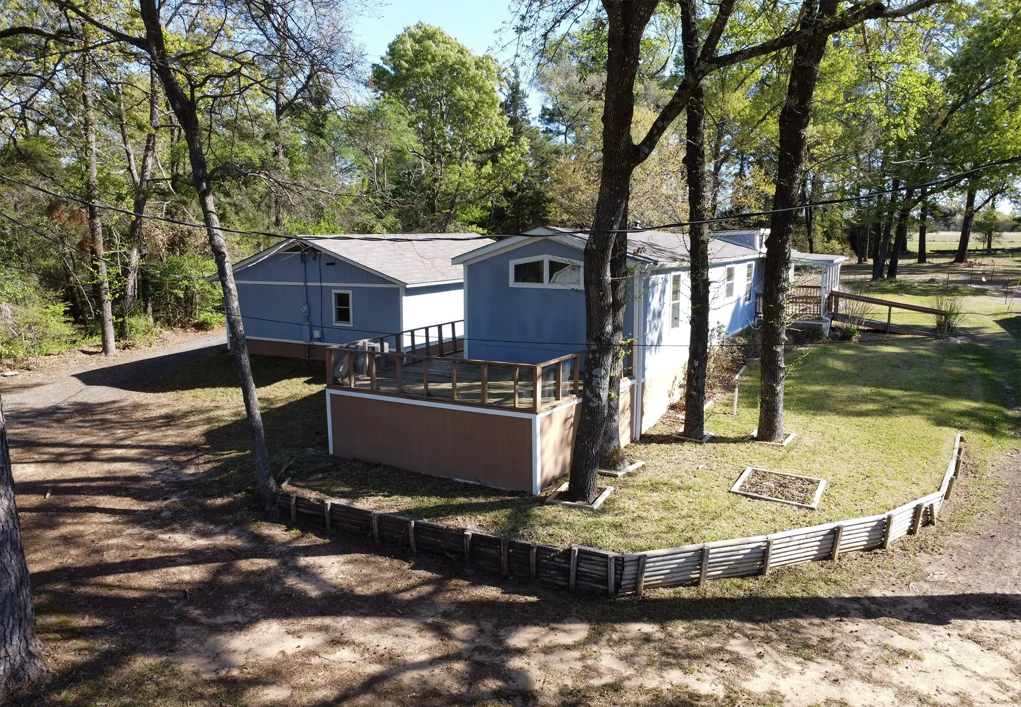 Manufactured Home For Sale in Henderson County , 2781 Lake Breeze Drive, Chandler, Texas 75758, 2 Bedroom, 2 Bathroom, 2 Garage spaces, 1,078 Sqft, built in 1984, mls#21217206, Real Estate Agent in Chandler, Homes For Sale in Henderson county, Homes For Sale in Chandler, Realtor in Chandler Texas, Real Estate Brokerage Independent Realty Texas, Luminita Cordes Realtor