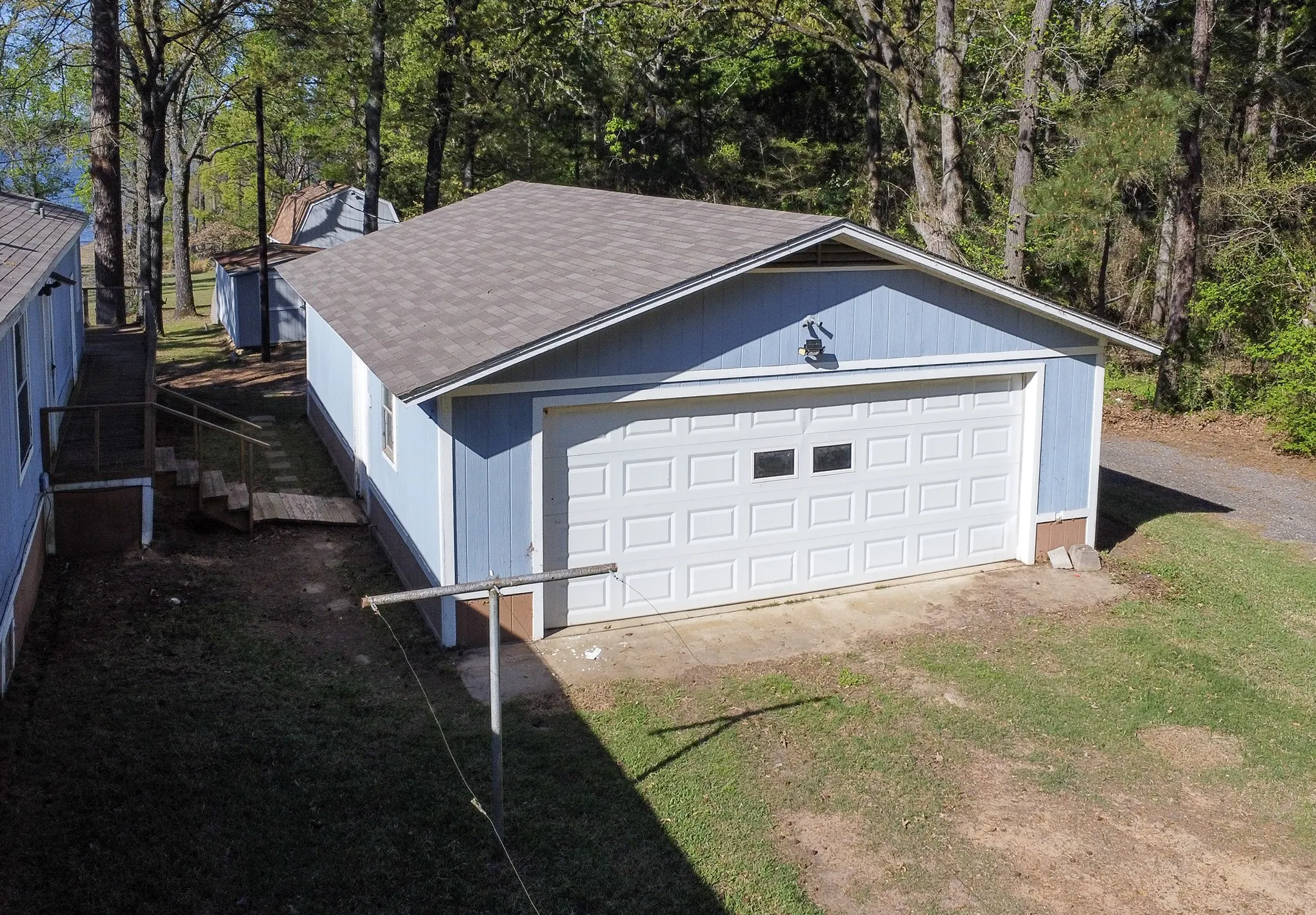 Manufactured Home For Sale in Henderson County , 2781 Lake Breeze Drive, Chandler, Texas 75758, 2 Bedroom, 2 Bathroom, 2 Garage spaces, 1,078 Sqft, built in 1984, mls#21217206, Real Estate Agent in Chandler, Homes For Sale in Henderson county, Homes For Sale in Chandler, Realtor in Chandler Texas, Real Estate Brokerage Independent Realty Texas, Luminita Cordes Realtor