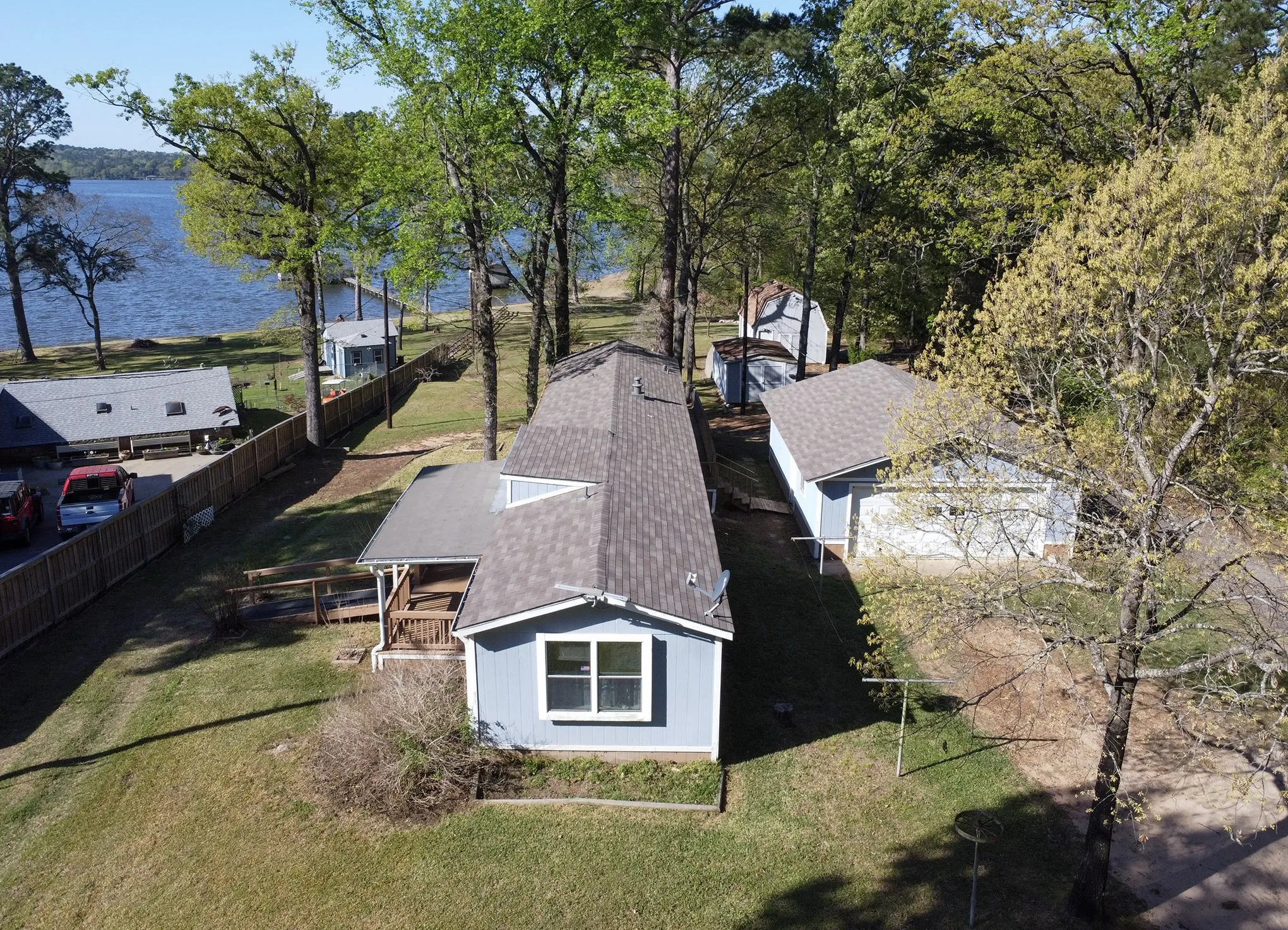 Manufactured Home For Sale in Henderson County , 2781 Lake Breeze Drive, Chandler, Texas 75758, 2 Bedroom, 2 Bathroom, 2 Garage spaces, 1,078 Sqft, built in 1984, mls#21217206, Real Estate Agent in Chandler, Homes For Sale in Henderson county, Homes For Sale in Chandler, Realtor in Chandler Texas, Real Estate Brokerage Independent Realty Texas, Luminita Cordes Realtor