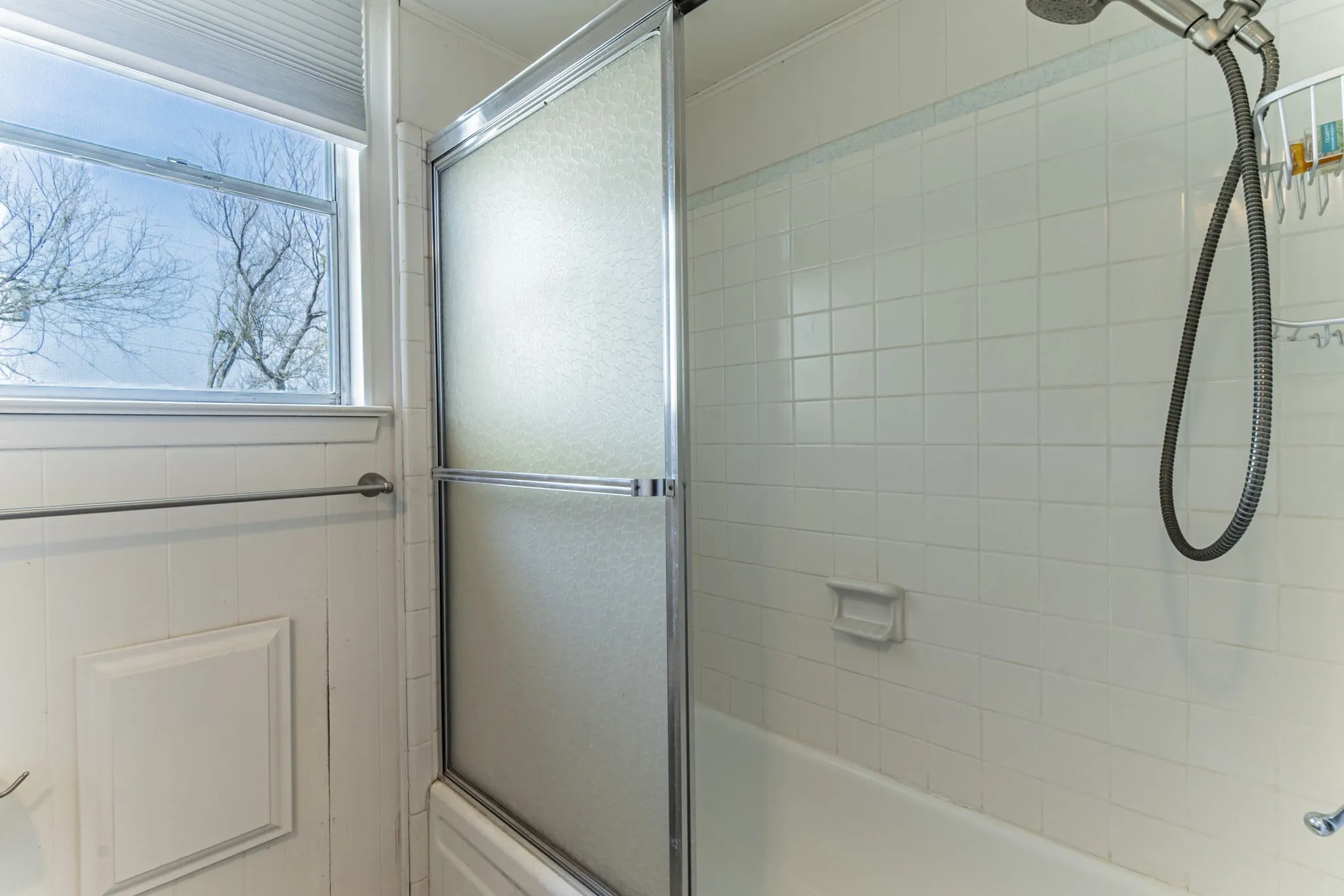 The upstairs bathroom has a tub/shower combination.