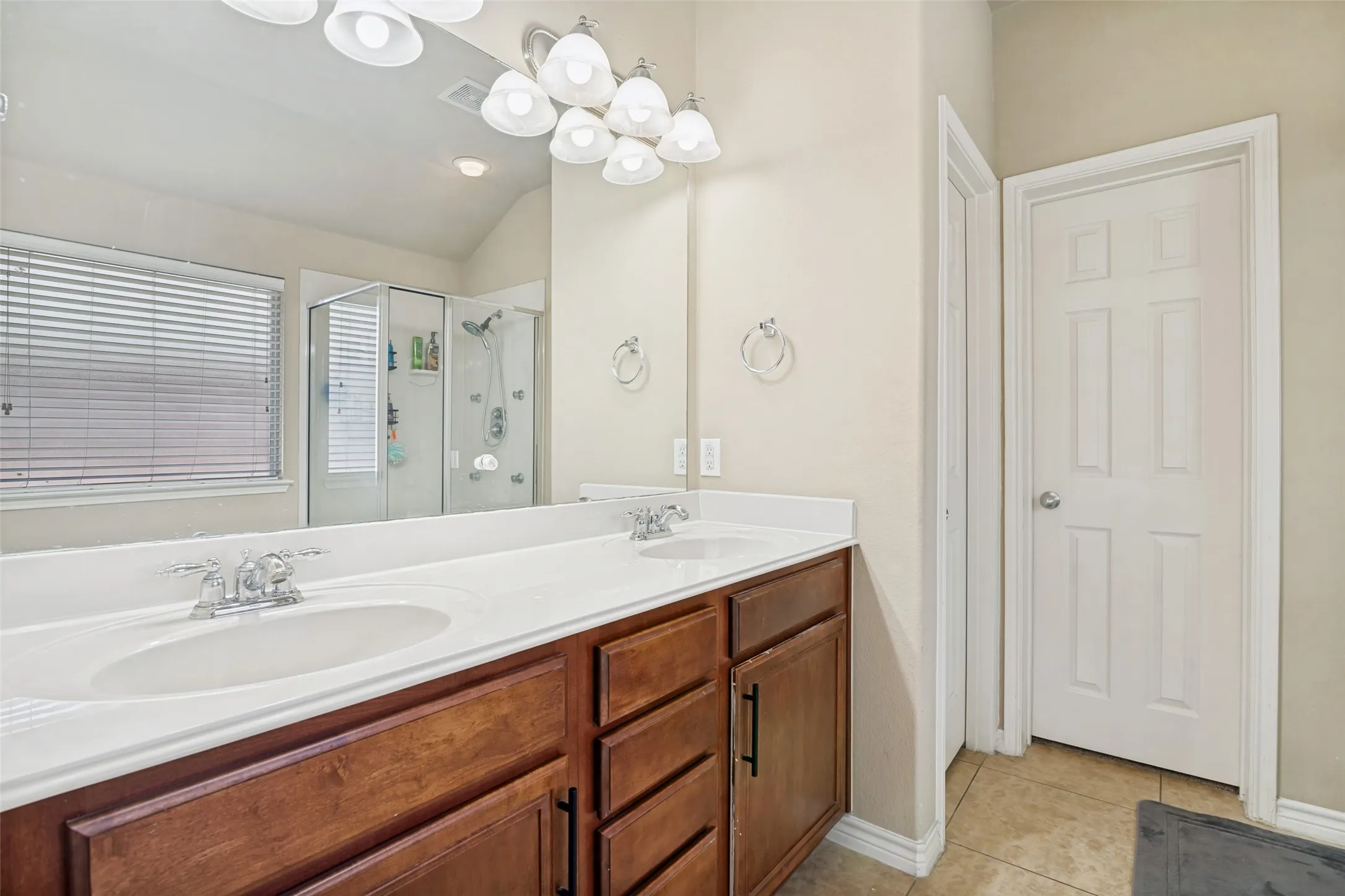 Double sinks in the primary bathroom, water closet, and large walk in closet.